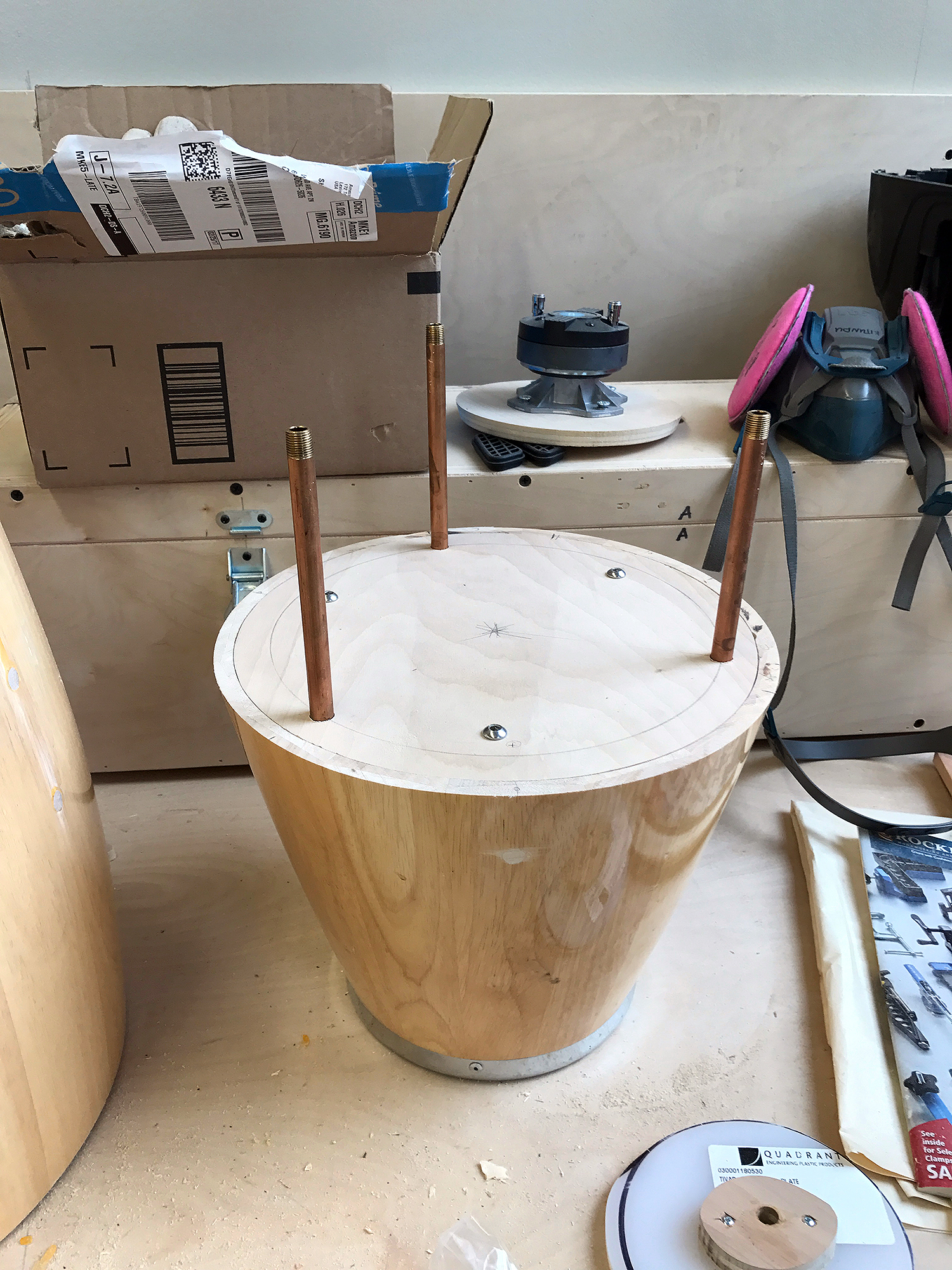 the lower portions hang from brass tubing