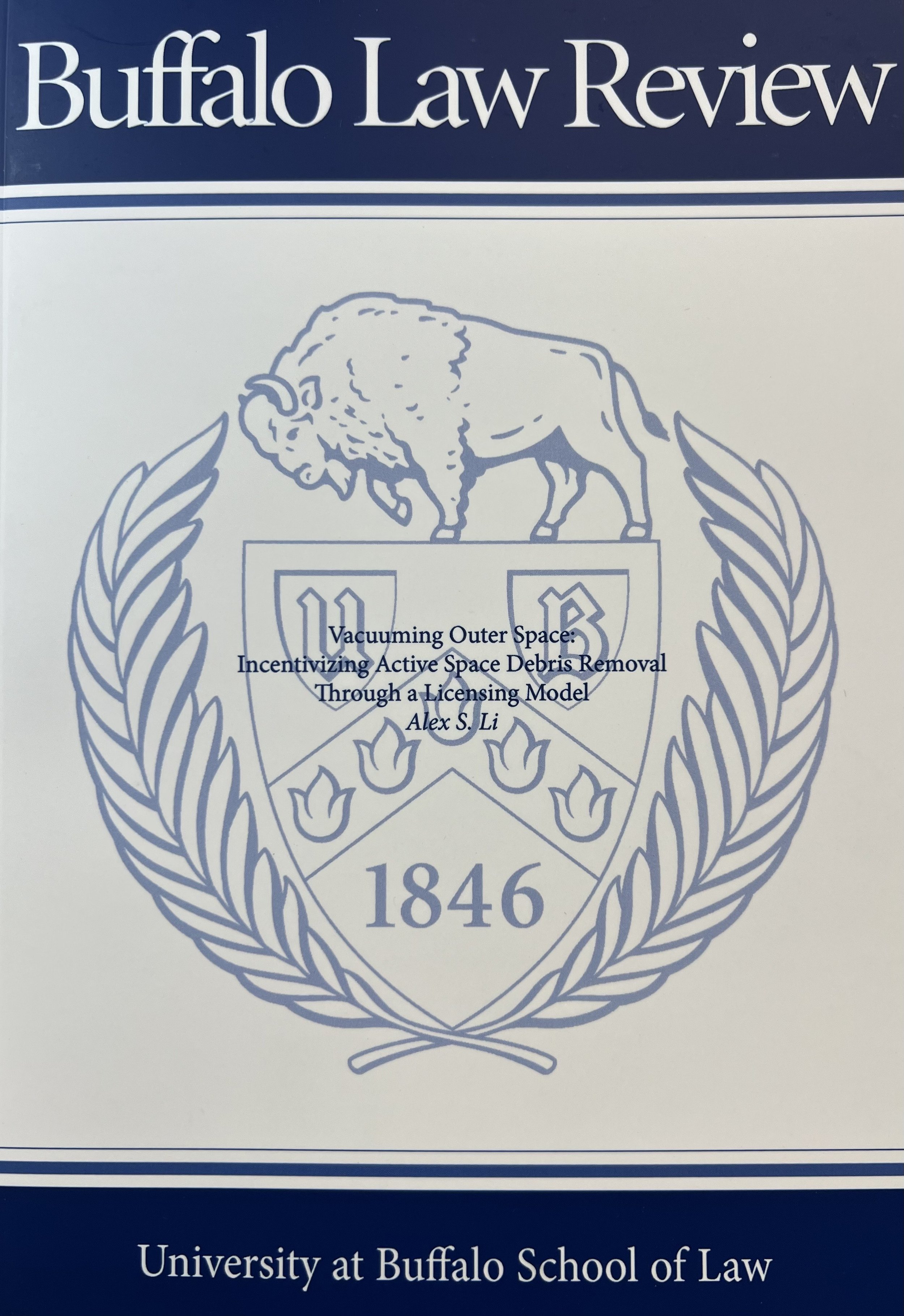 Vacuuming Outer Space: Incentivizing Active Space Debris Removal Through a Licensing Model