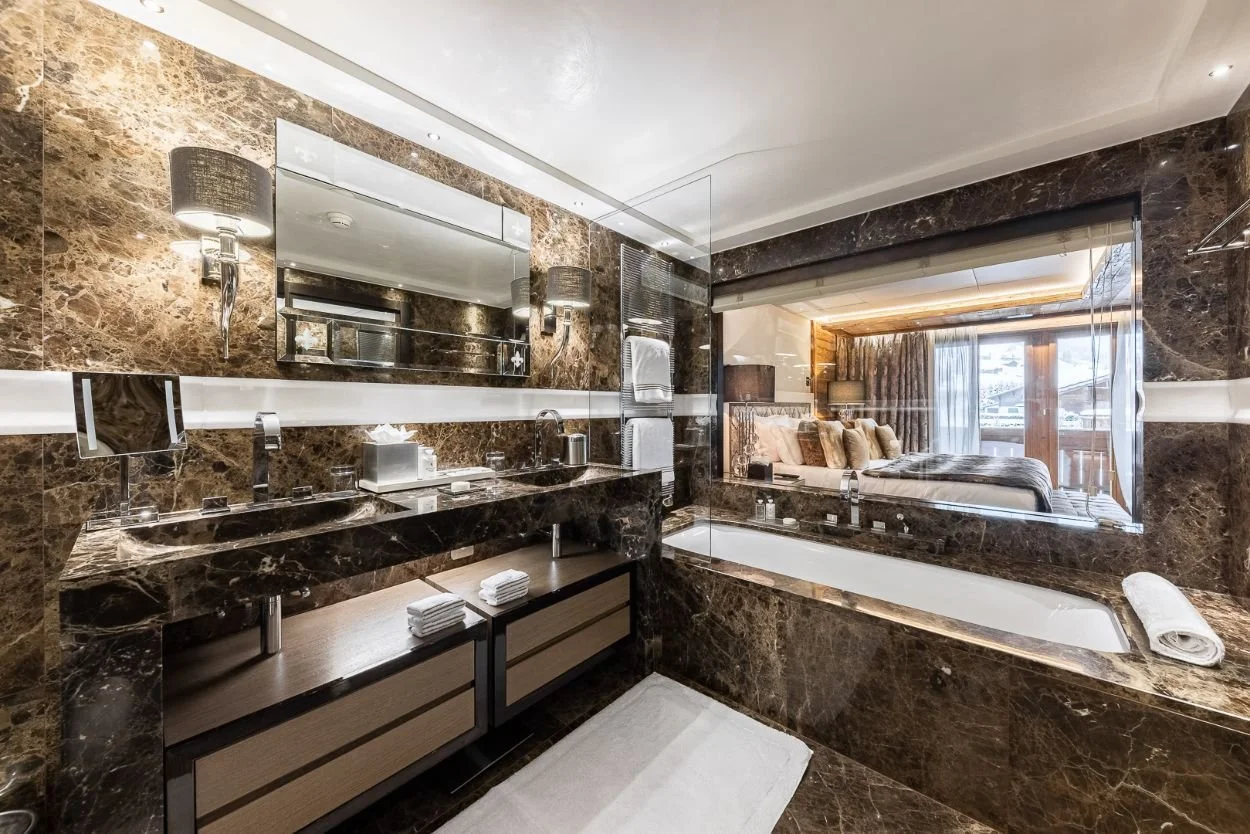 ULTIMA GSTAAD -3 bedroom residence ensuite dark marble.jpg
