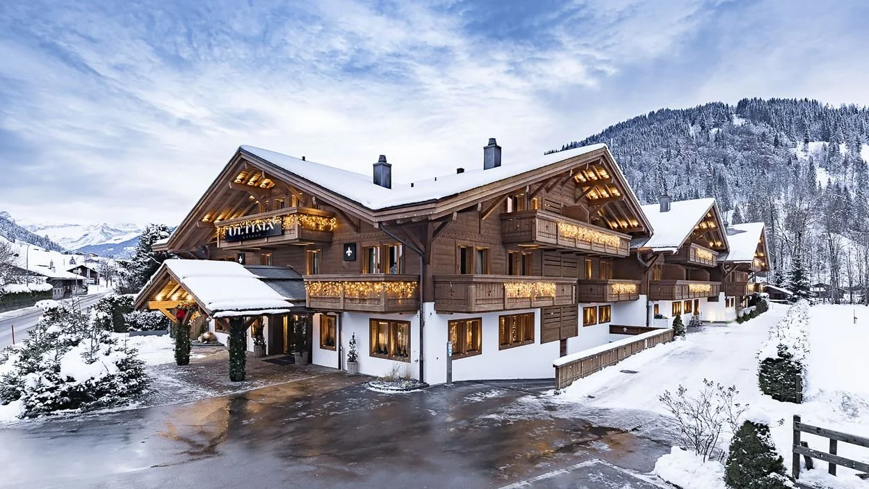 Ultima Gstaad Hotel Exterior in the snow.jpg