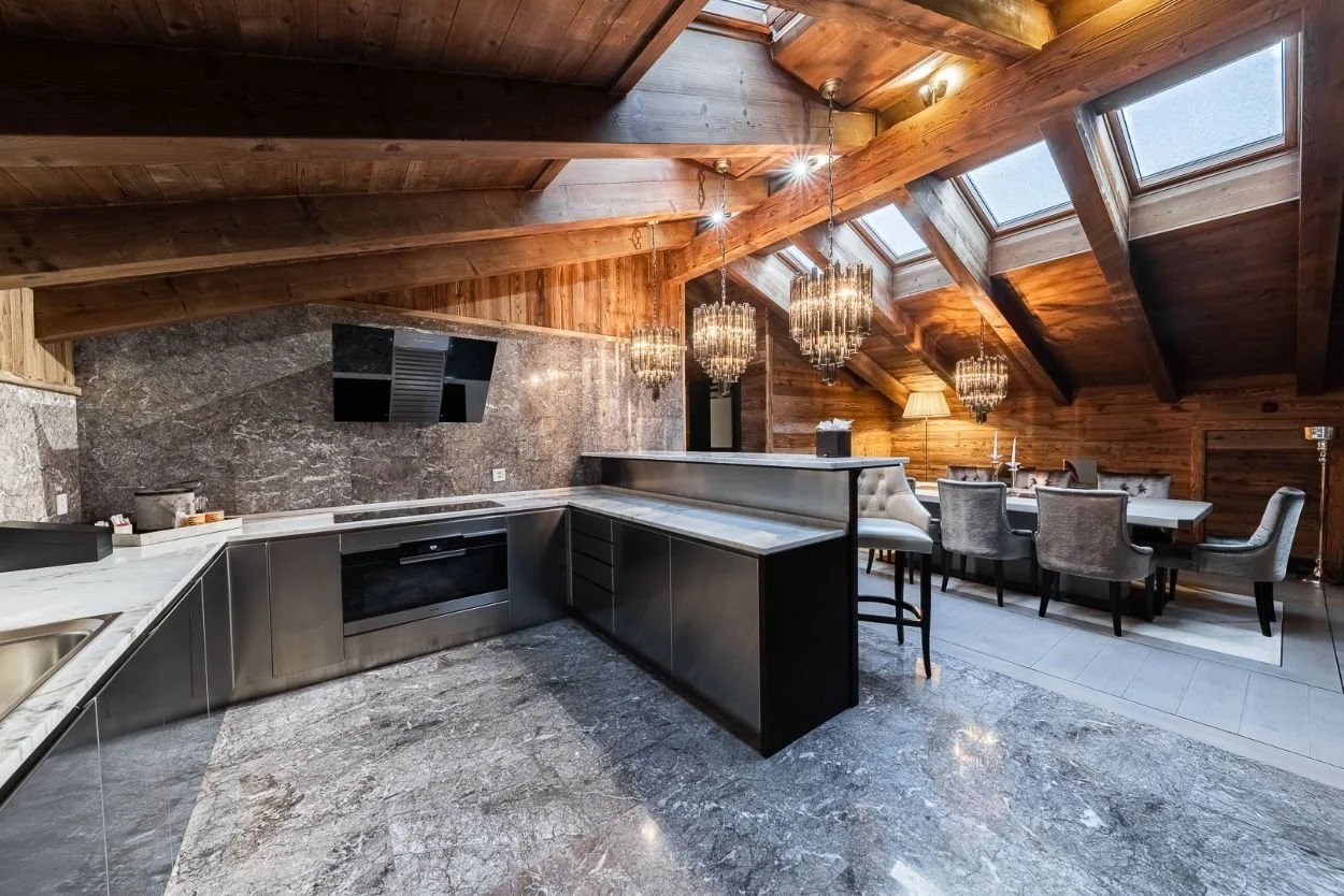 Ultima Gstaad Royal Residence Living Room Kitchen Open Plan.jpg