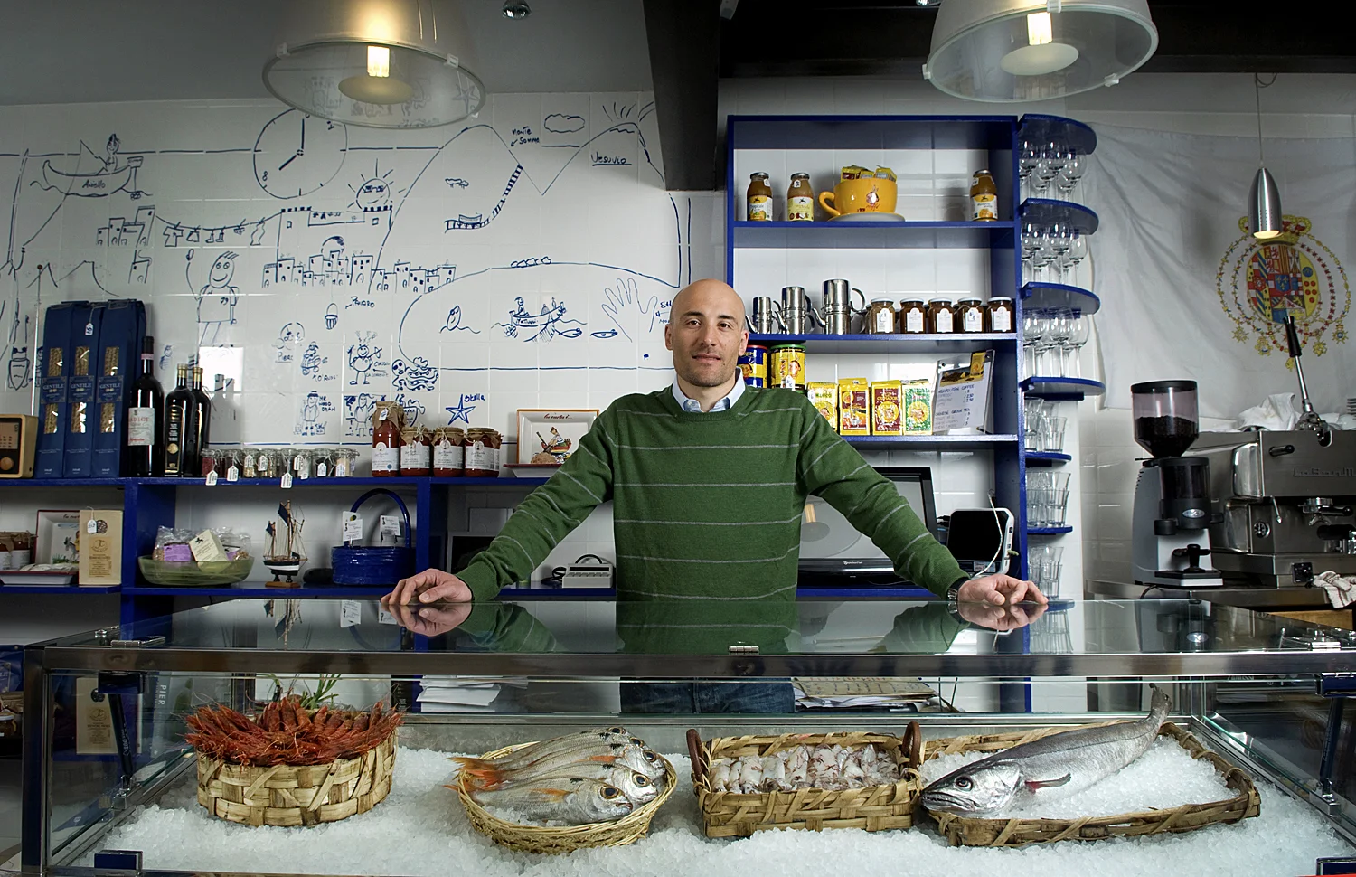 Environmental Portrait of a fishmonger in a fish restaurant in Nottinghill , London