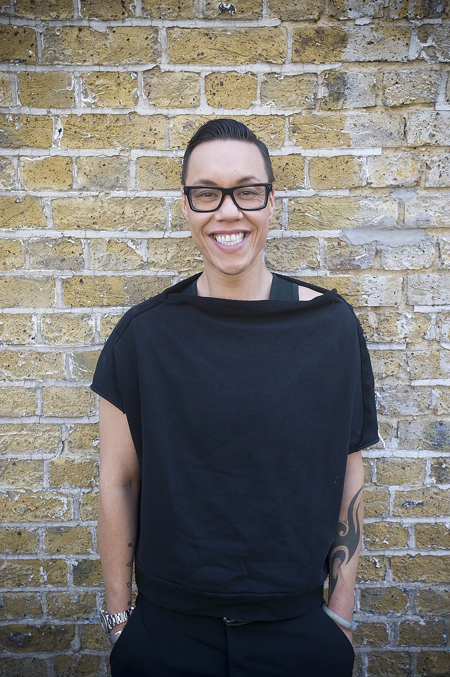 Portrait of Fashion Designer Gok Wan outside his Shoreditch Studio