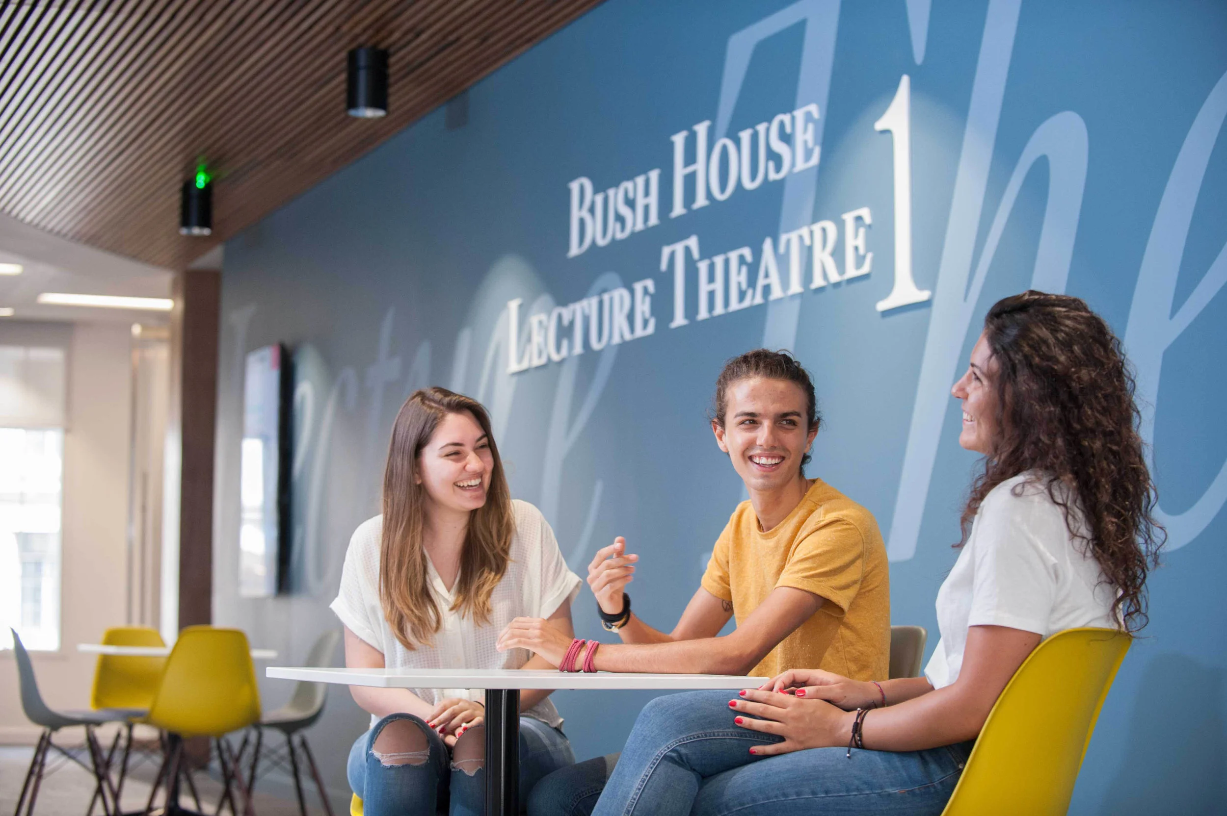 Portrait of Students laughing and talking at Kings College London