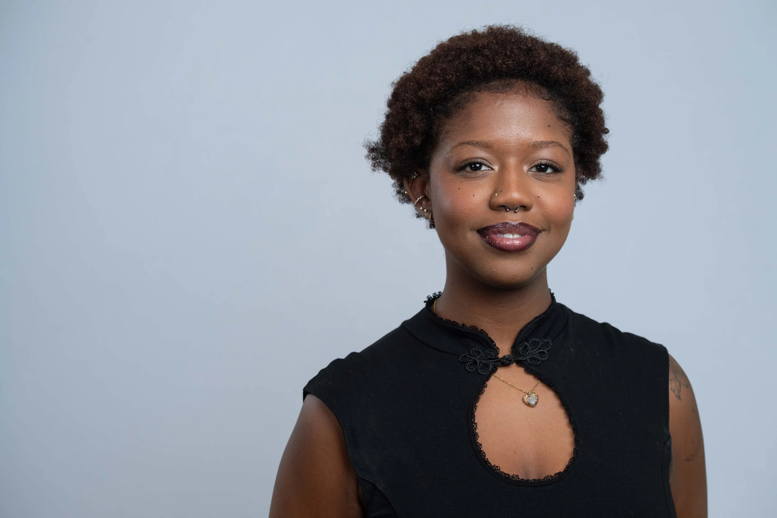 Headshot Portrait of a Young Black Woman in a London Office