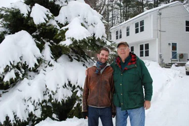 With my father in front of my childhood home during a typically snowy Maine winter