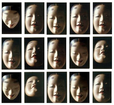 A character purchases a Noh mask in Japan which changes emotion depending on how it is tilted