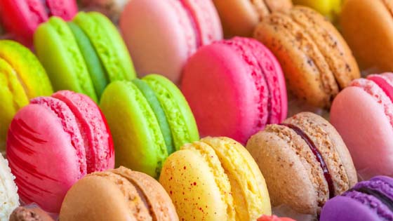 Faith regularly makes macaroons with her father's partner Michel to sell at a weekend farmer's market