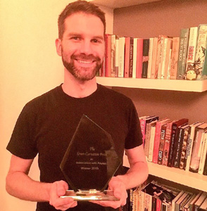 Holding the crystal shard of a prize