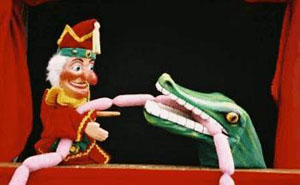 "In England, Punch is a sensitive chap; any passerby who so much as looks at him the wrong way is promptly strangled with a string of sausages."