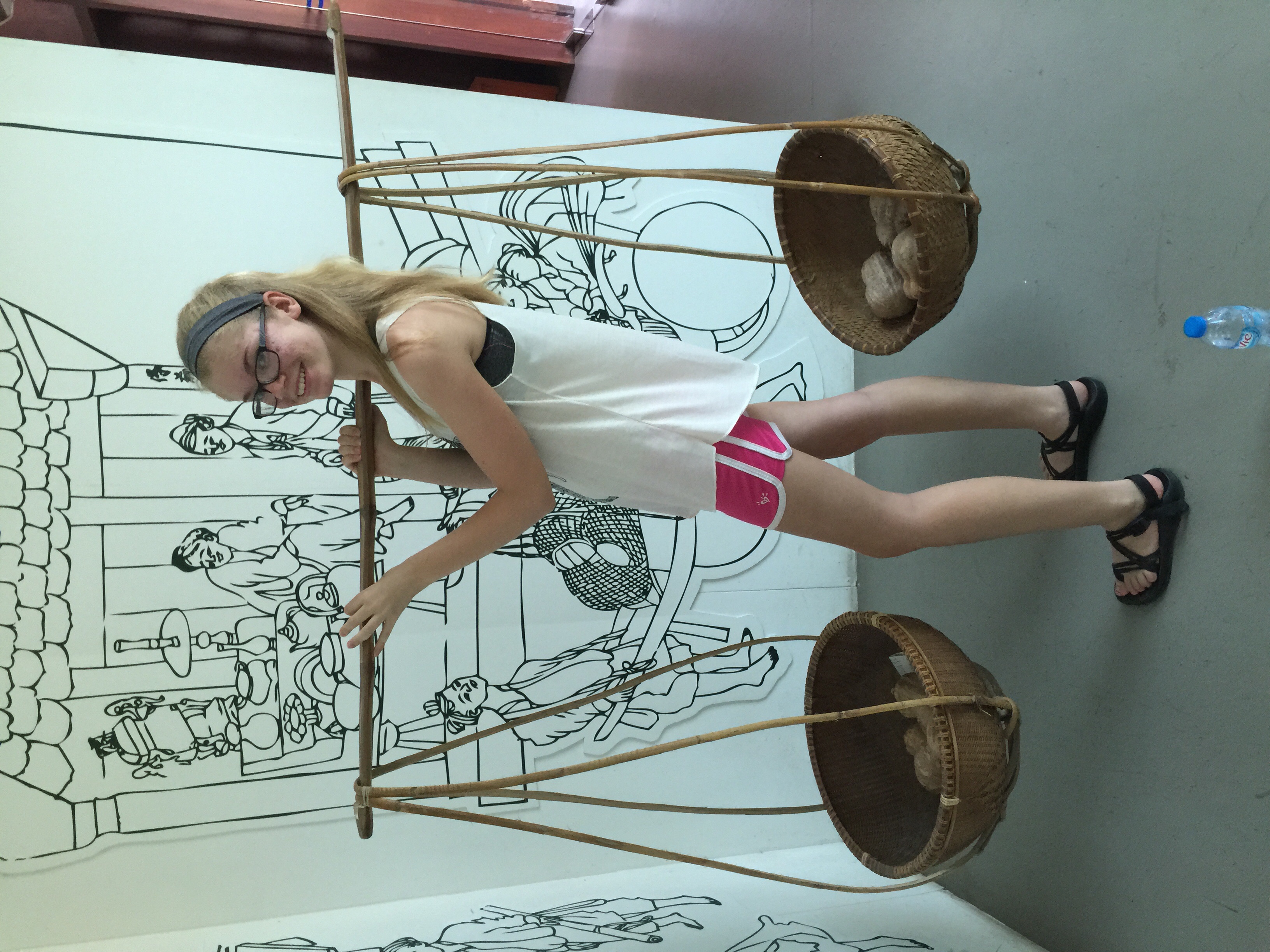 Maeve and I visited the Women's Museum. She tried to experience how local women carry goods. 