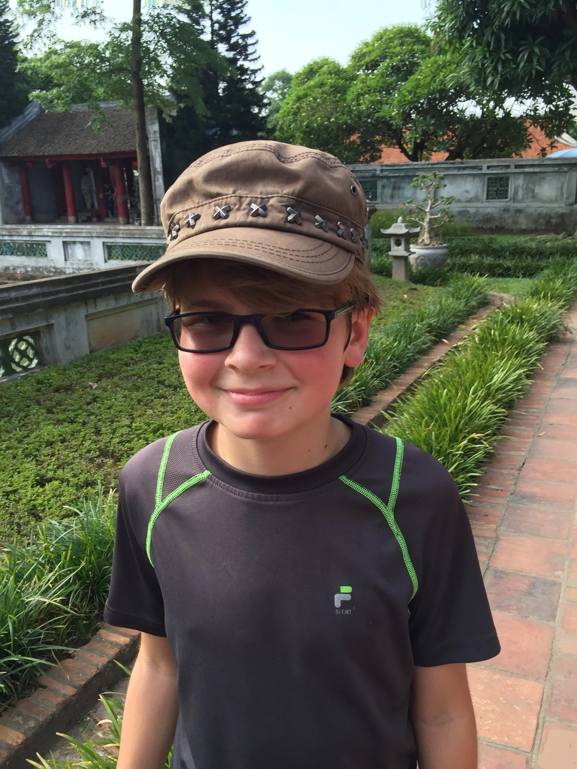 Liam had once again charmed the university tour guides and one let him wear her hat. 