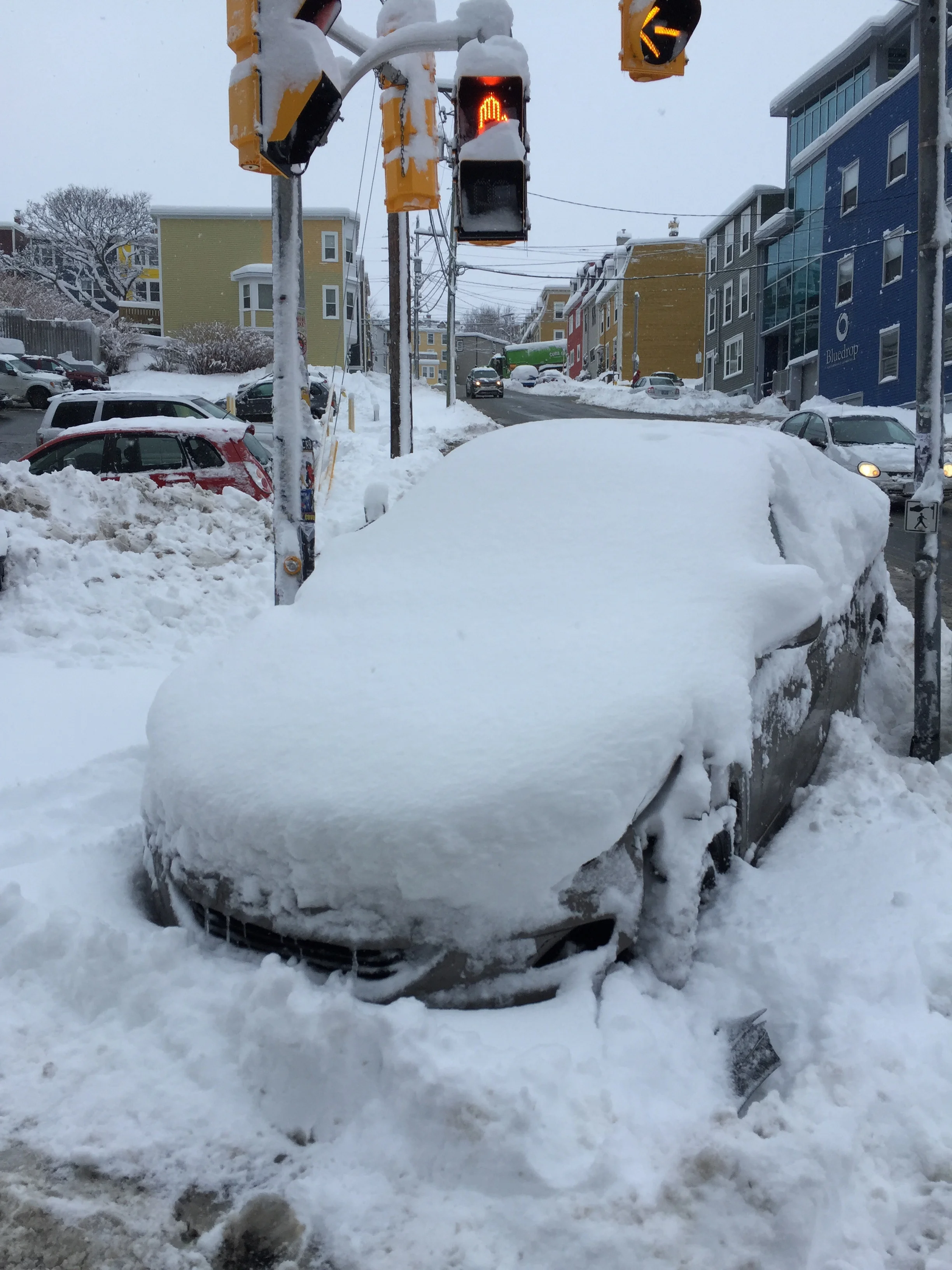 Someone couldn't navigate through the intersection and ended up on the sidewalk and just left the car there. Just down the street from our place.&nbsp;