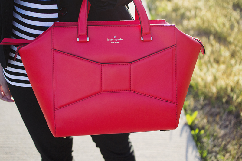 I fell victim to the Kate Spade sale recently and ordered this gorgeous bright Beau as a work bag for half of it's original price! I fell in love with this bag when it was first released (uh, hello, bows!) but my excitement waned slightly when I saw it on the arms of several large bloggers (c/o, of course). I constantly struggle with not wanting to be a follower (baaaah) but also really loving something even though everyone already has it (hello, rockstuds and pashli). Some things are just good, though, and this bag is one of those things. PS - it has a padded tech pocket for my iPad. Kind of a selling point for me. It's plenty large enough to tote my daily necessities to work and back and I got a great deal, so I don't regret this purchase at all.
