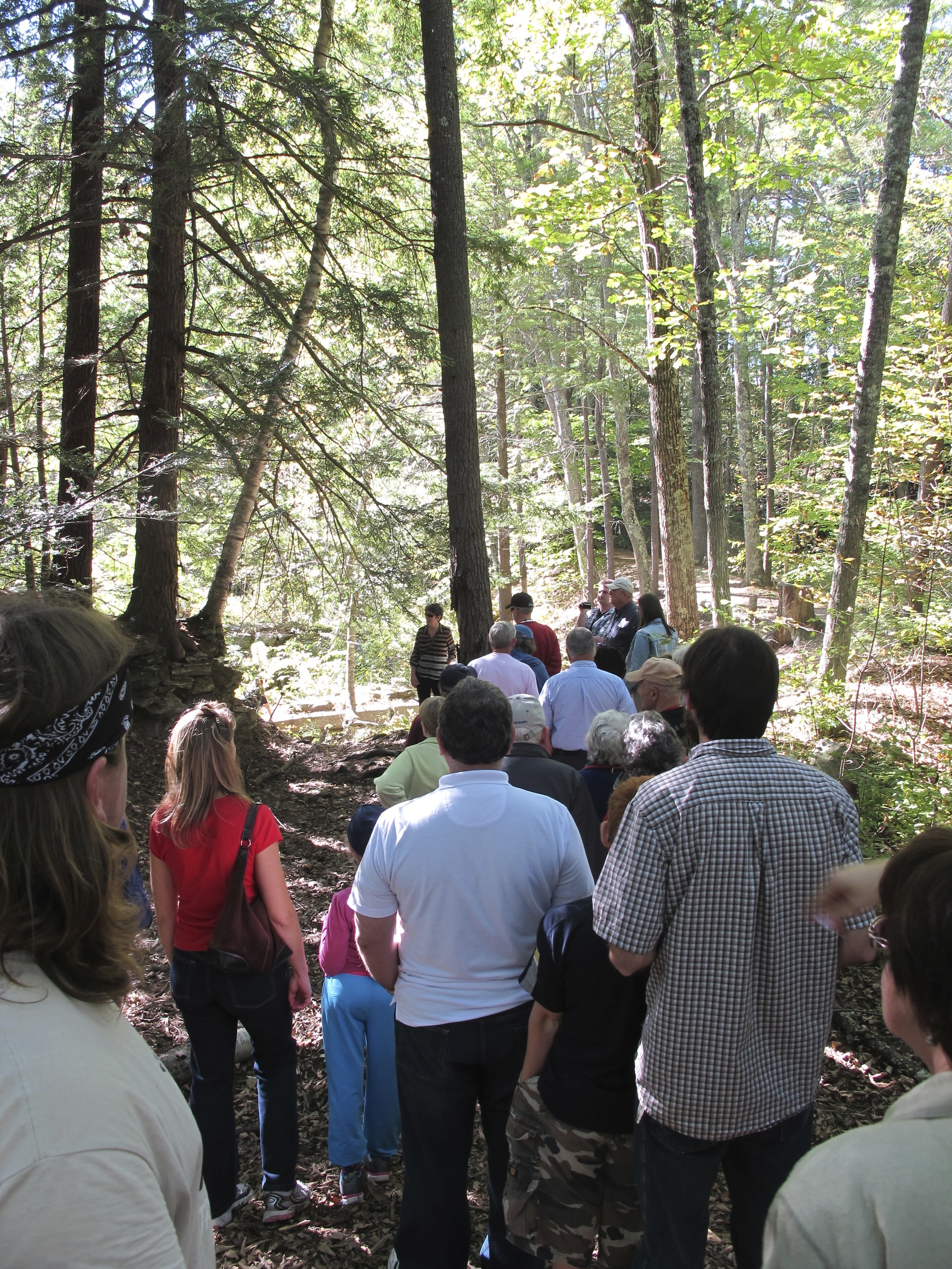  A large crowd congregates at the gunpowder mills tour and talk with curator Don Wescott.&nbsp; 