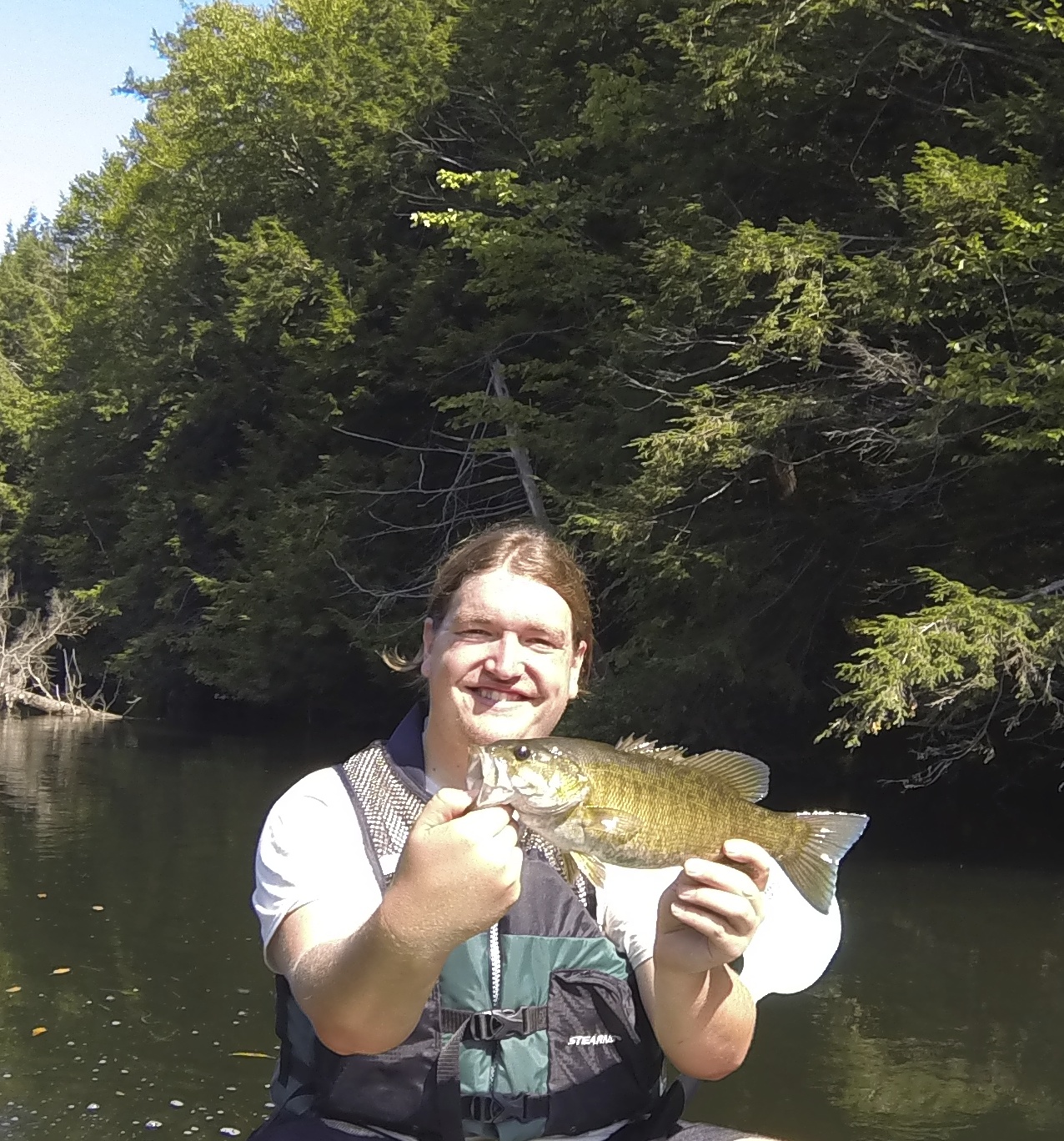  Kyle shows off a largemouth bass. 