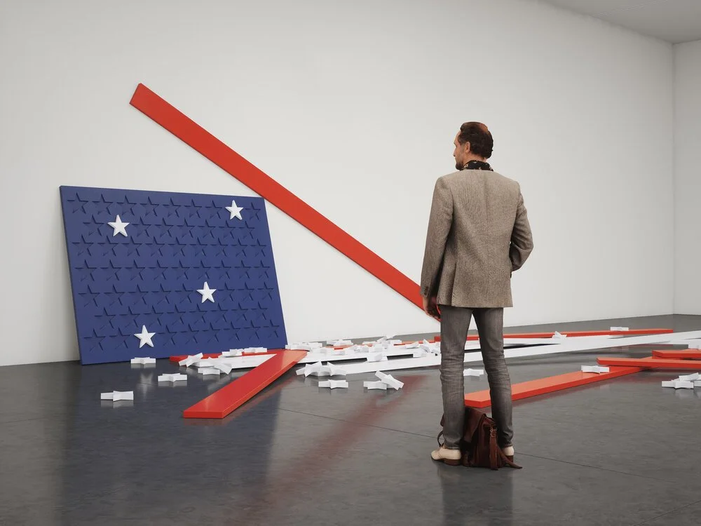 Art installation in a gallery featuring a sculptural rendition of the American flag in a state of disassembly.jpg