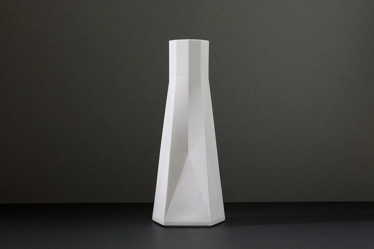 Front view of 1882 Tall Vase in Bone China on dark background
