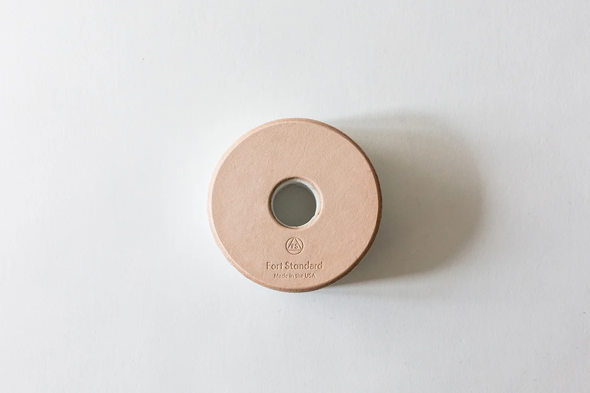 Leather bottom of Round Stone Candle Holder on White Background