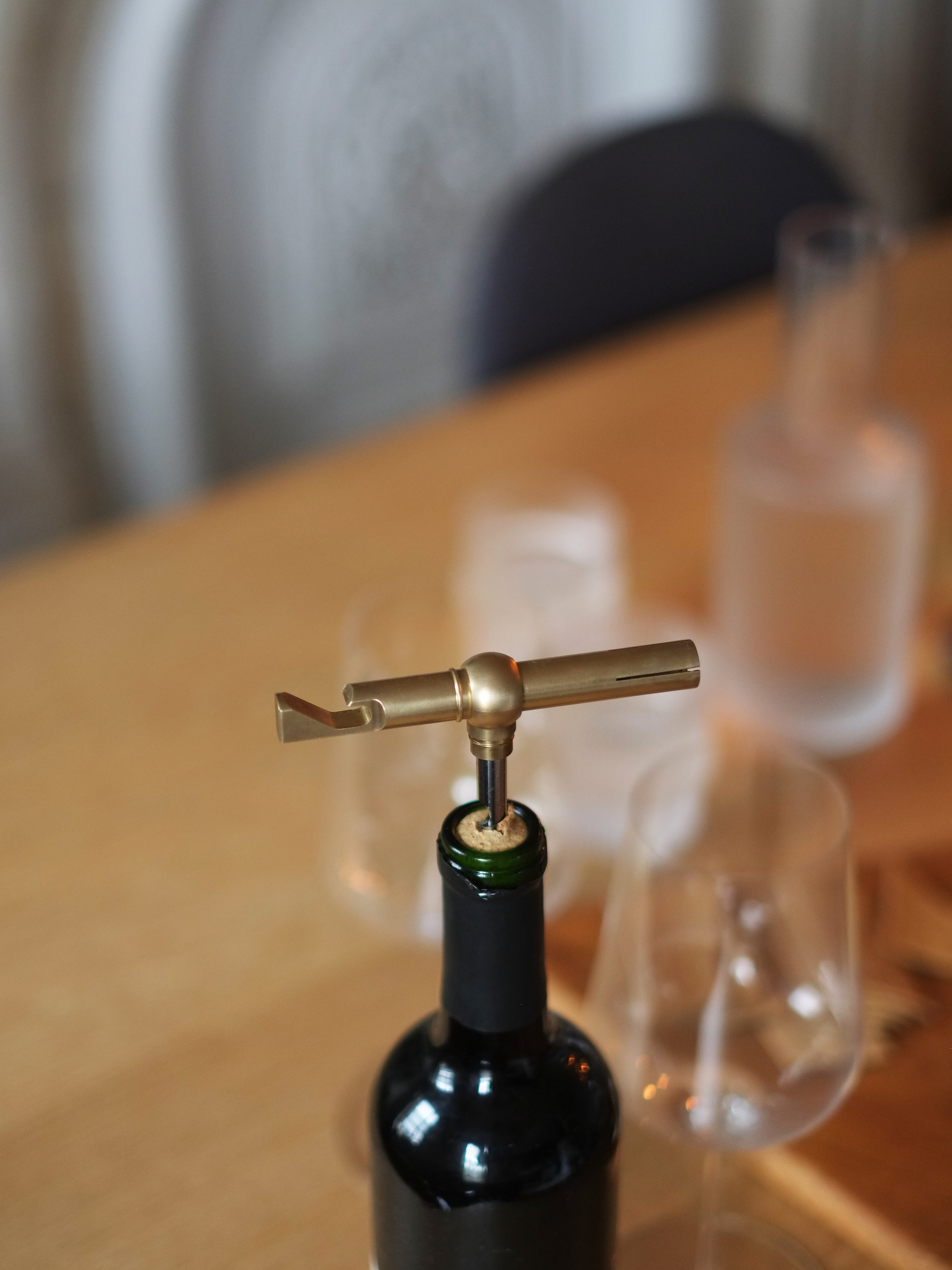 Collect Corkscrew in use inside of a wine bottle