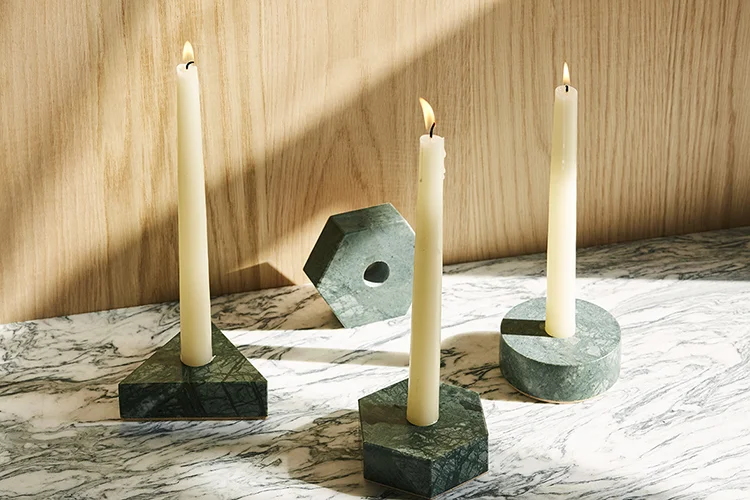 Green Marble Candle Holders in Circle, Triangle and Hexagon Shapes Sitting on Stone Countertop