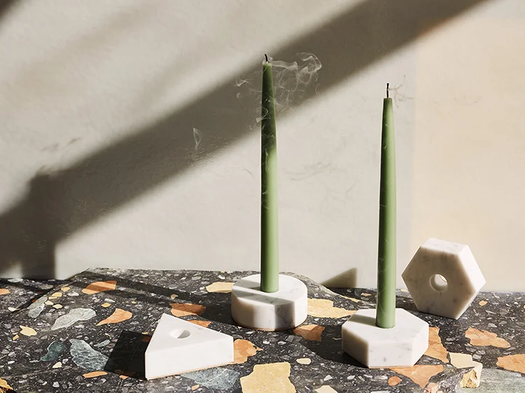 White Carrara Marble Candle Holders in Circle, Triangle and Hexagon Shapes Sitting on Stone Countertop