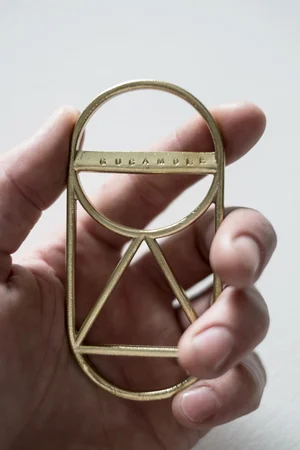 Detail Shot of Custom Stamped Crest Bottle Opener