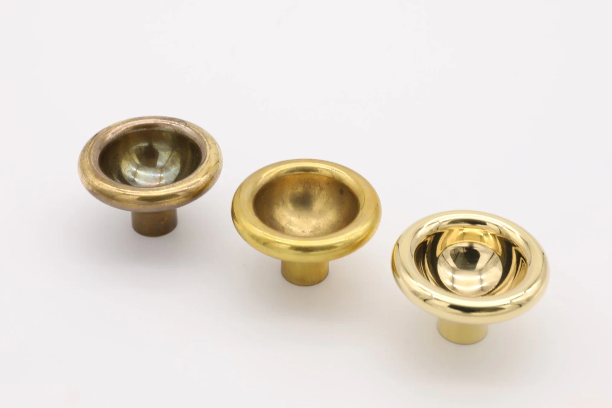 Image shows 3 stages of patina on brass knob: highly polished, light patina, deep patina.