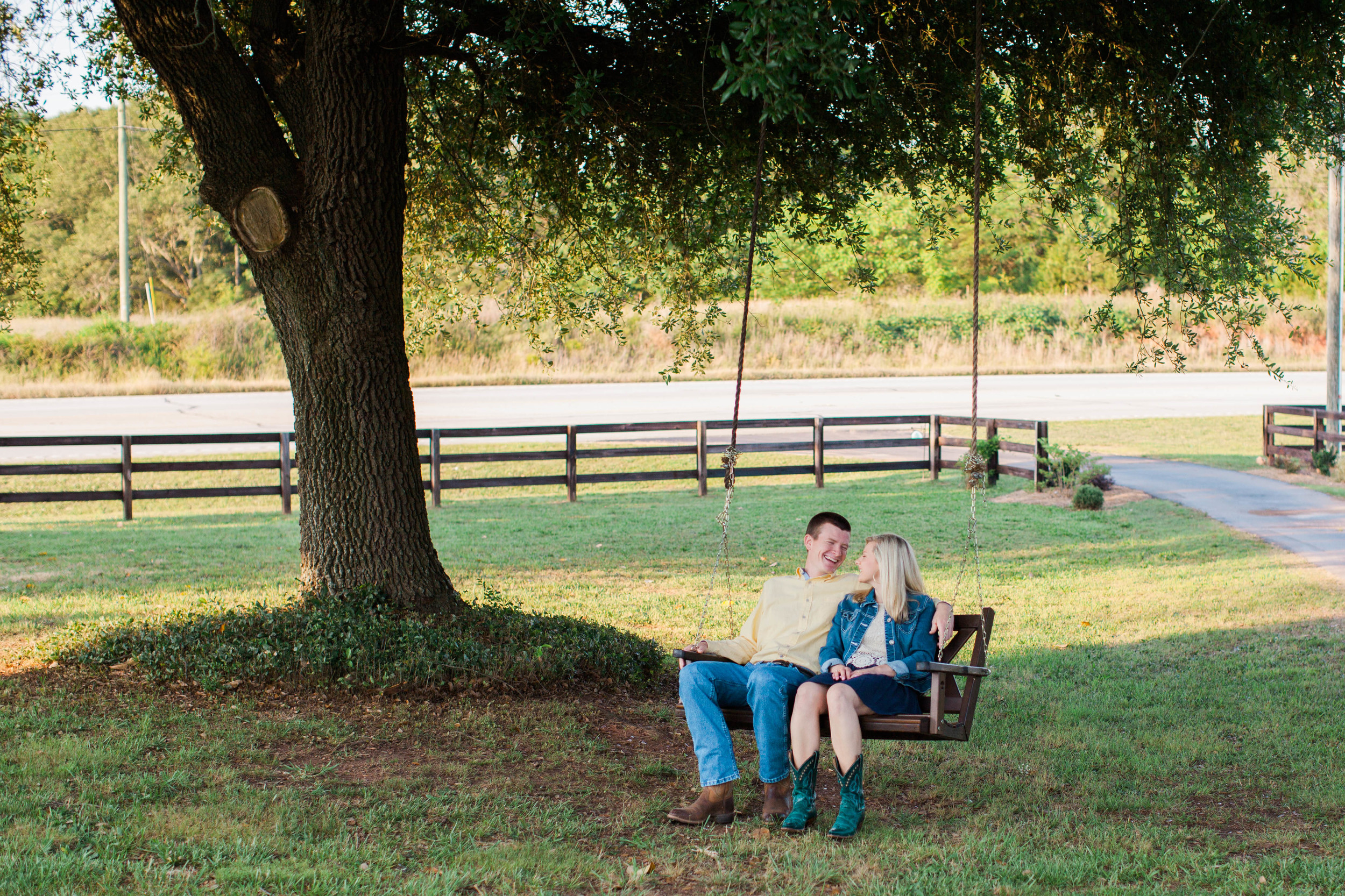 Couple in love at their engagement session at Ellery Farms