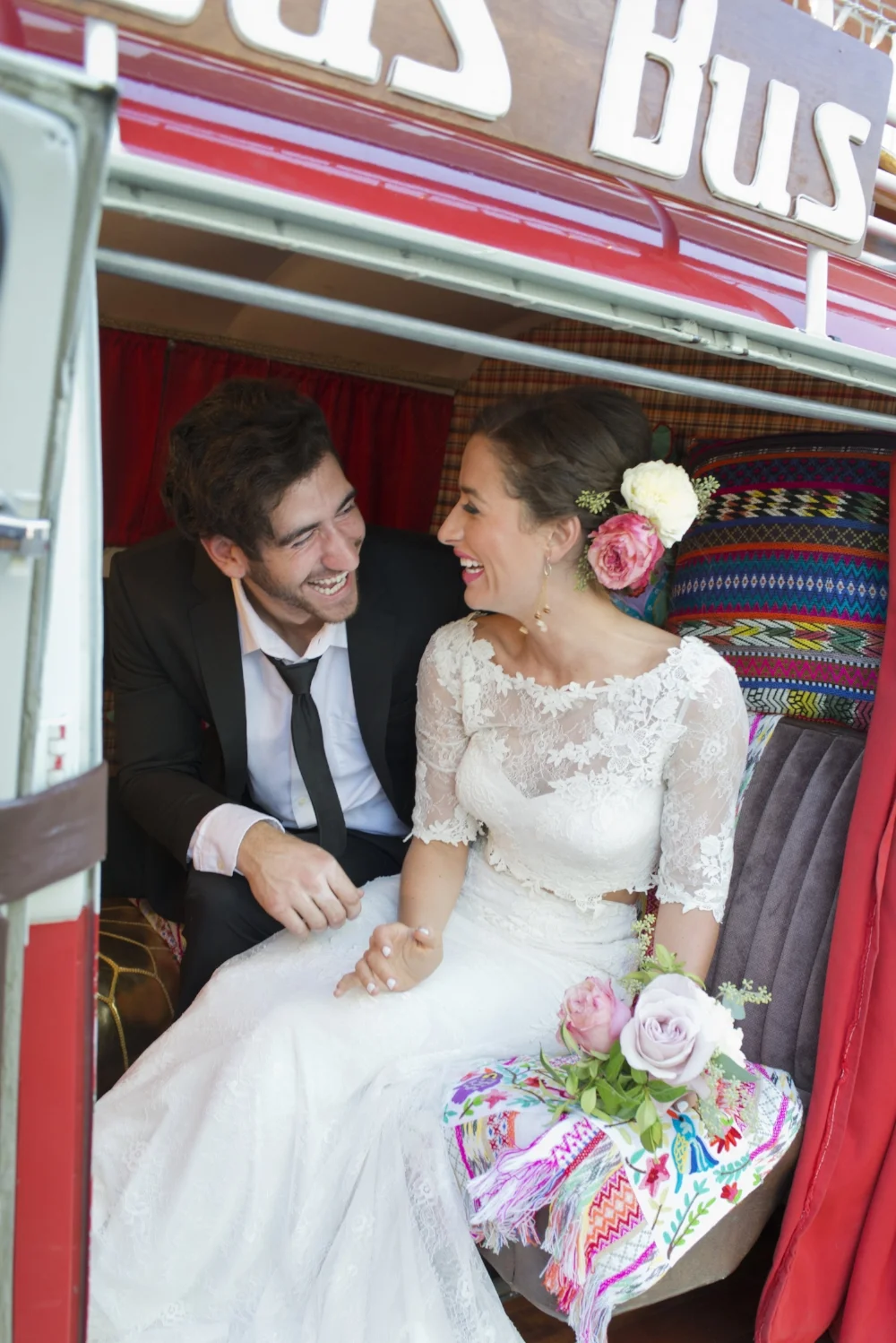 This couple was too much fun! Getting silly for their photo session in Das Bus. Photo by Christine Glebov.