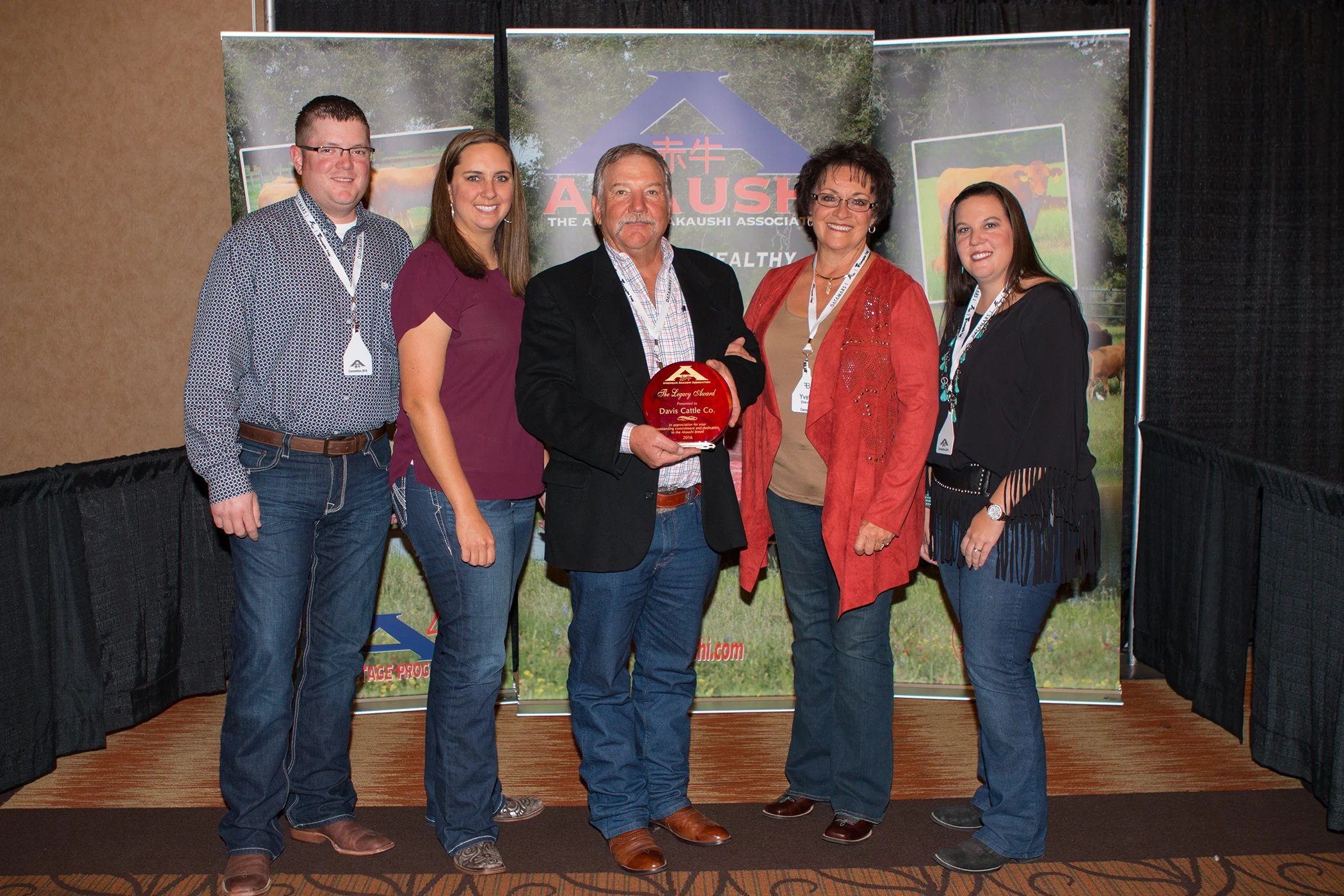 Phil Davis and family of Davis Cattle Company - Bar O Ranch, Cascade, Idaho were presented The American Akaushi Association “Securing The Legacy Award” at their recent convention in Lubbock, Texas. This award is presented annually to the individual, family or ranch, that has provided key leadership and marketing efforts for the American Akaushi. L to R: Will Caldwell, Katlin Davis, Phil And Yvette Davis, Sarah Davis Swain