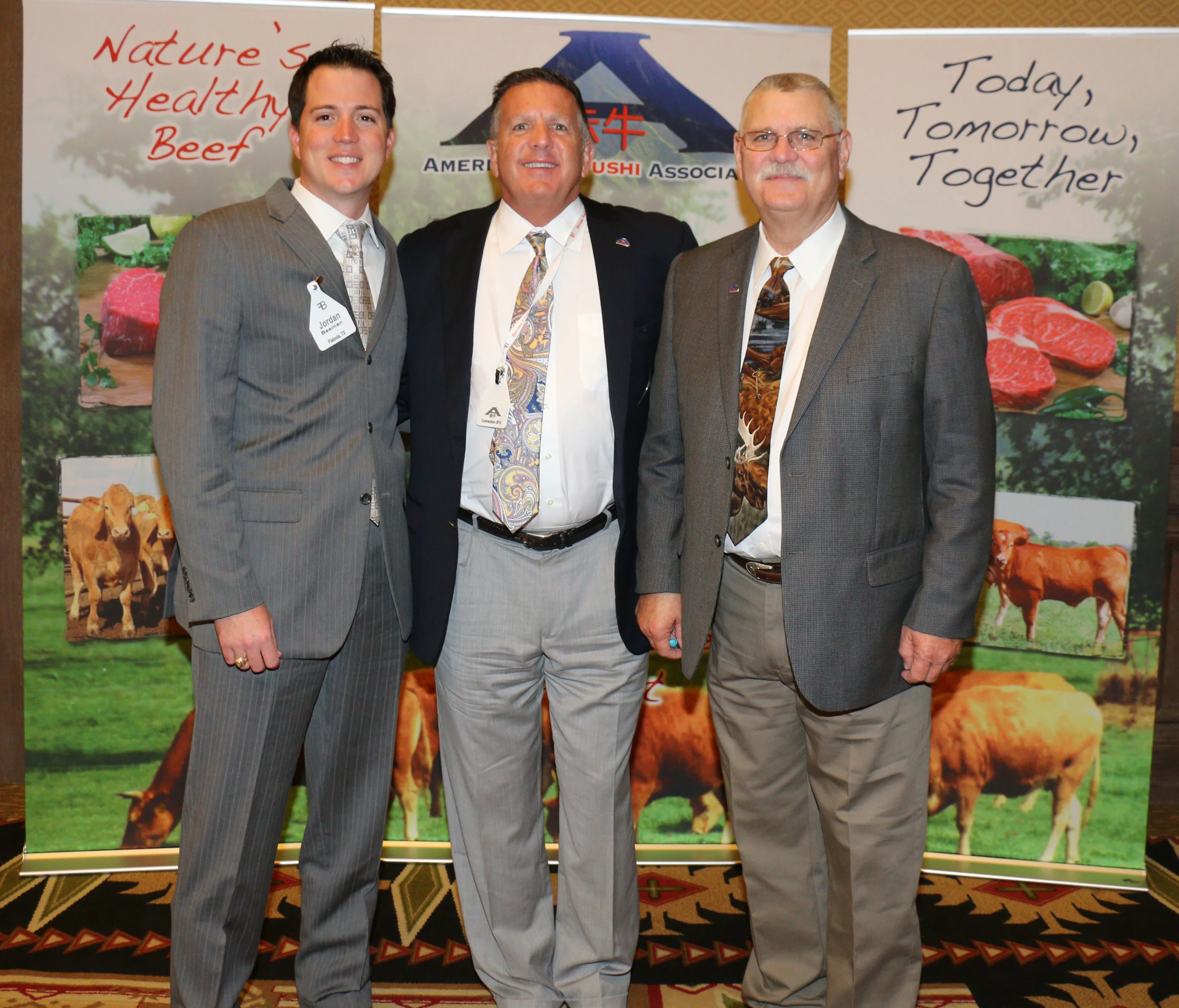 Jordan Beeman, president of Heartbrand beef, left and Bubba Bain executive director the American akaushi association, right, were proud to present the inaugural "Prime Plus" award to Jake Hickton and Bob slane of burger Monger. Jake Hickton of burger monger, center.