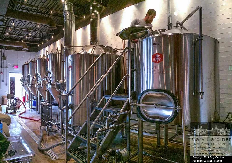 Alex Francis mashing in at Temperance Row Brewing Co. (Nov. 2014) Photo Cred: Gary Gardiner