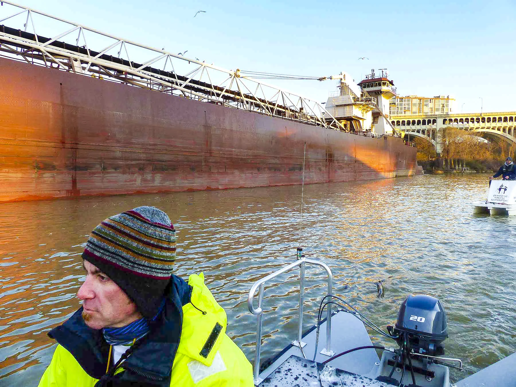  maritime and recreation co-existing on the cuyahoga river - it wouldn't be as interesting without both!