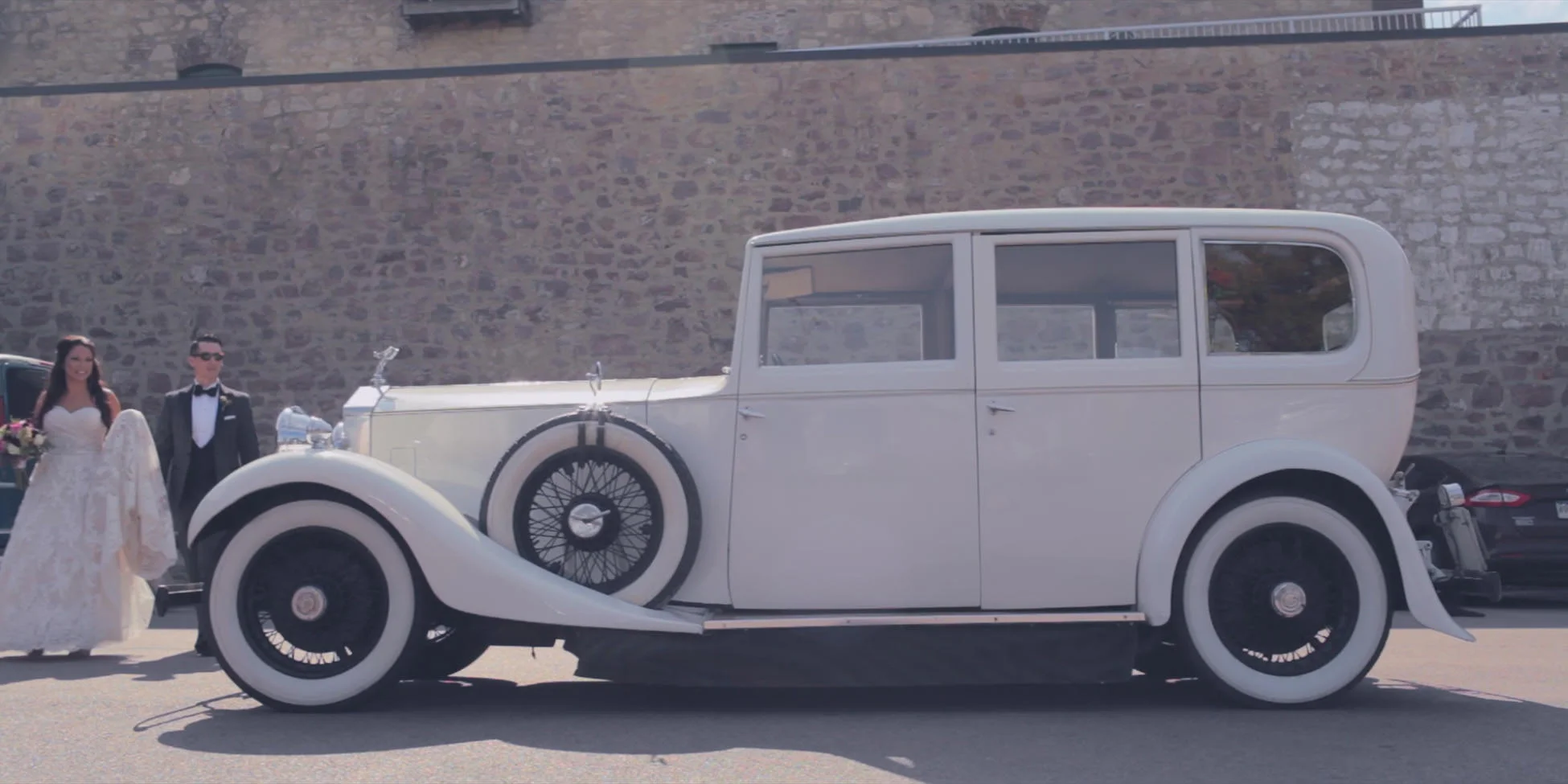 rolls royce wedding car bride and groom
