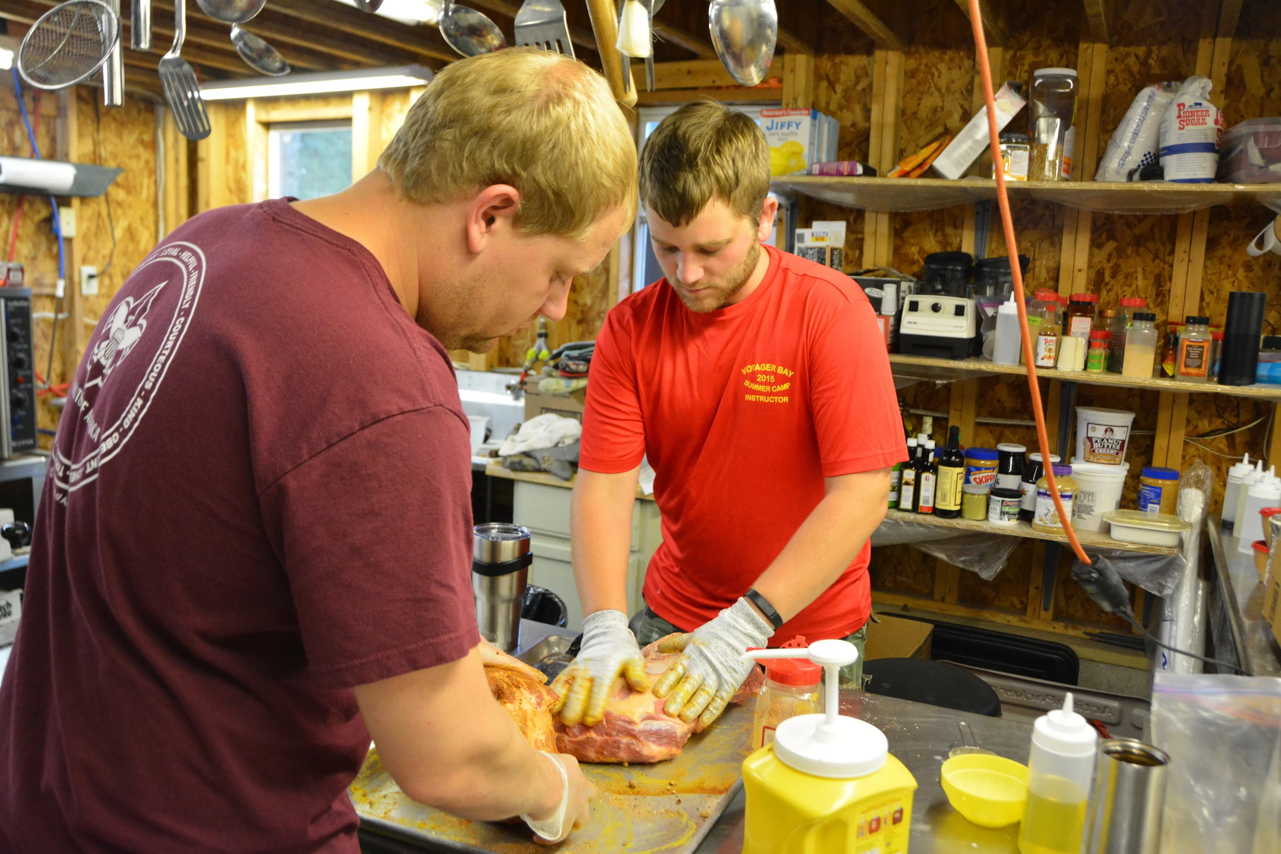 the cooks preparing the meat for tonight