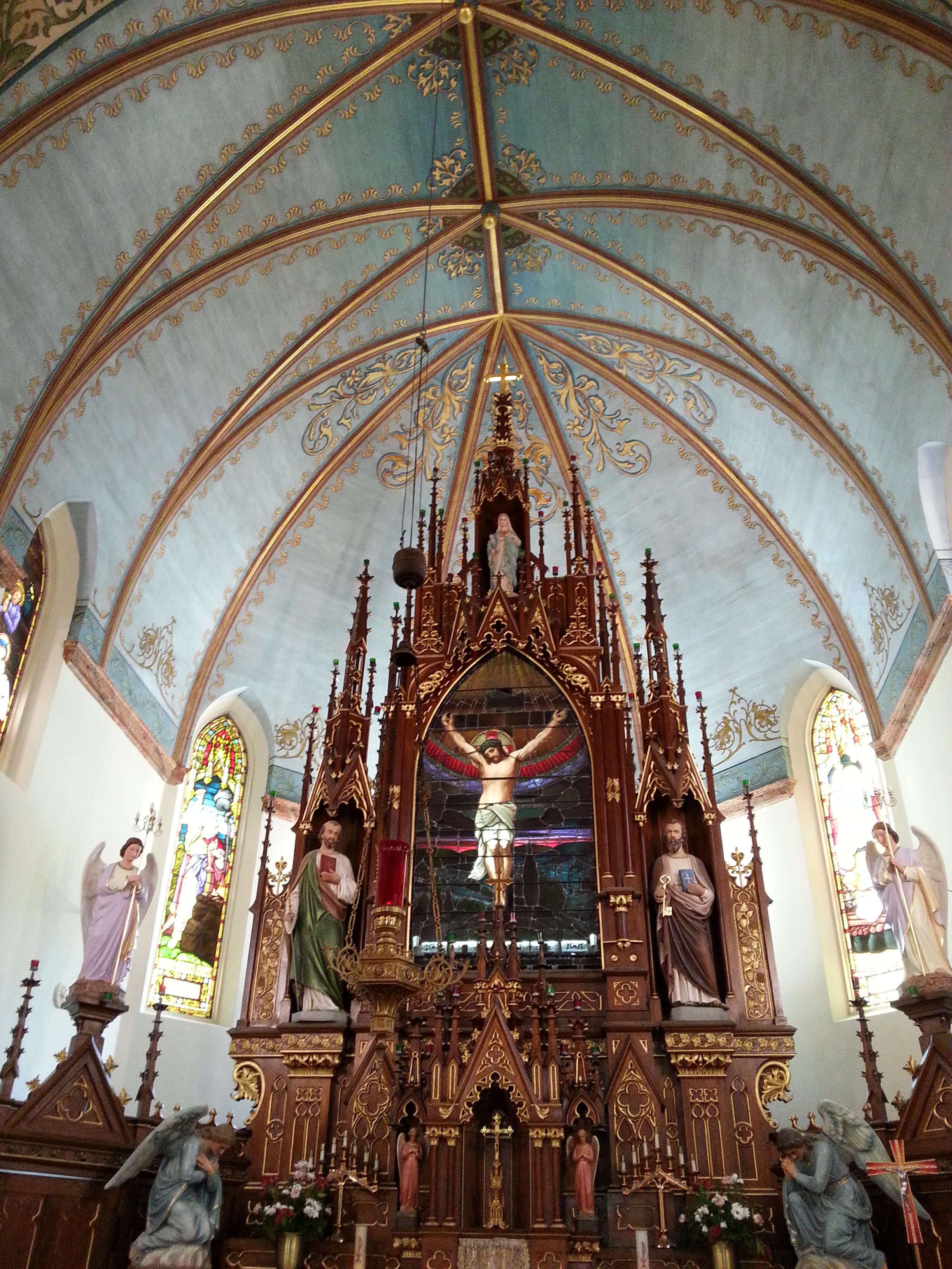 Church of the Nativity of Mary, Blessed Virgin, High Hill, TX (The ceiling is painted canvas, custom cut to fit each section of the ceiling. Every single section of the ceiling is three-sided--a symphony of triangles.)