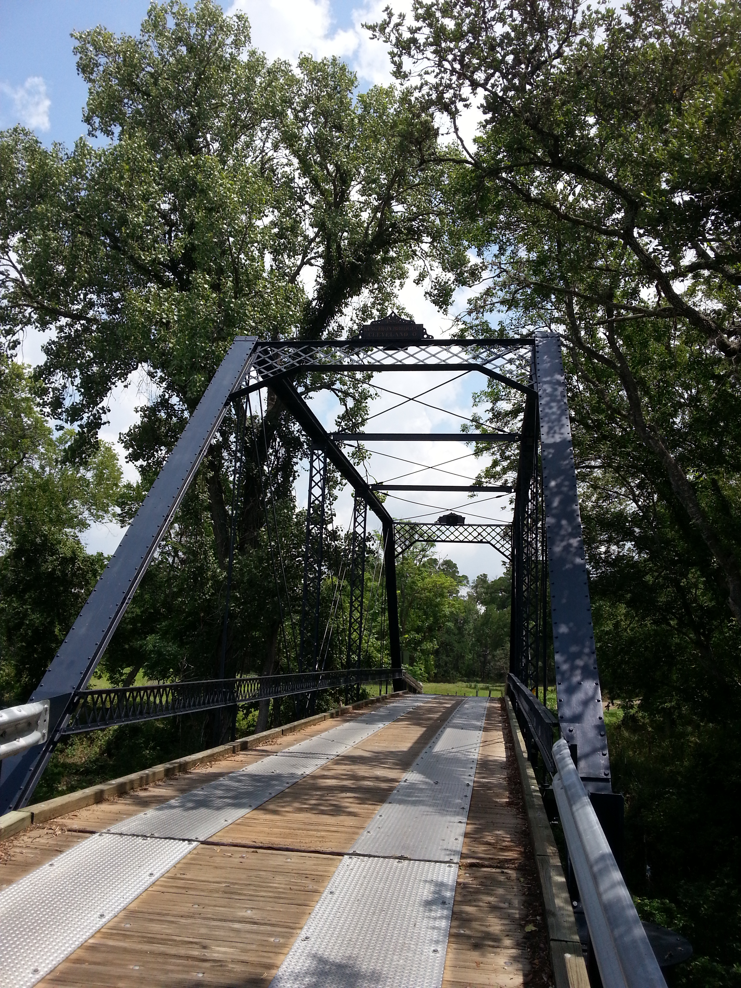 There's got to be a story behind this fancy bridge. It was built in 1885 by the King Iron Bridge Company of Cleveland, Ohio, to span a tiny creek. 