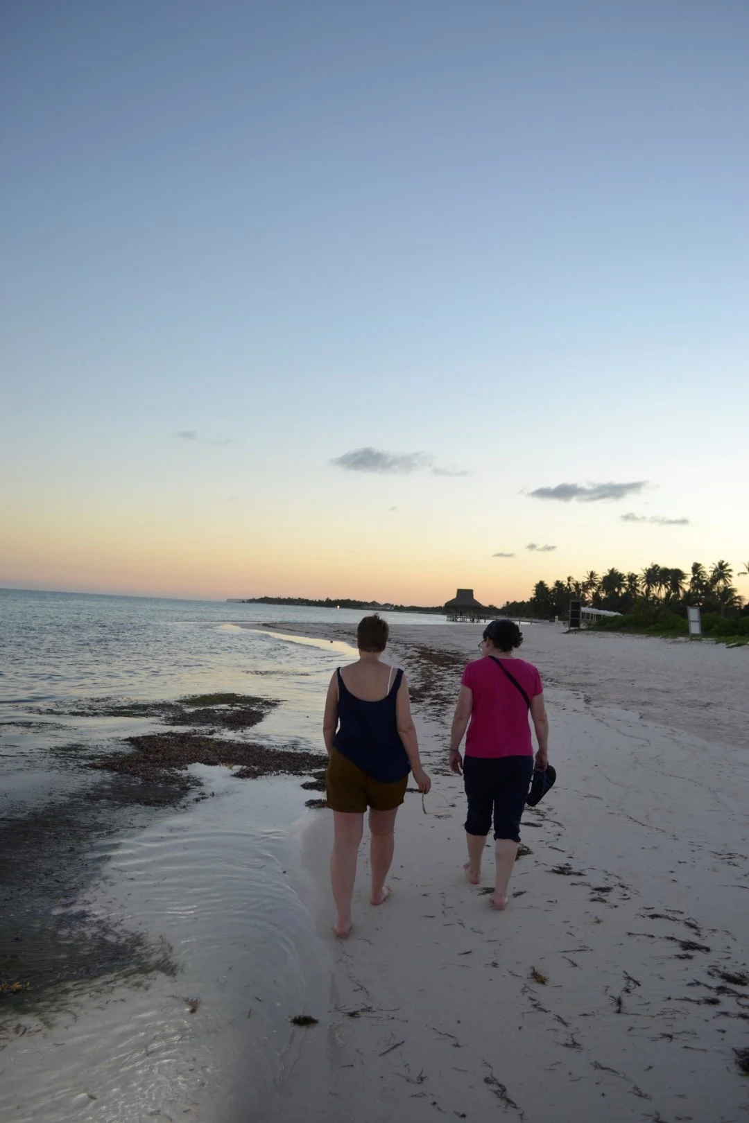 self and friend, walking the beach in the Dominican Republic (photo: Andy Bruner)