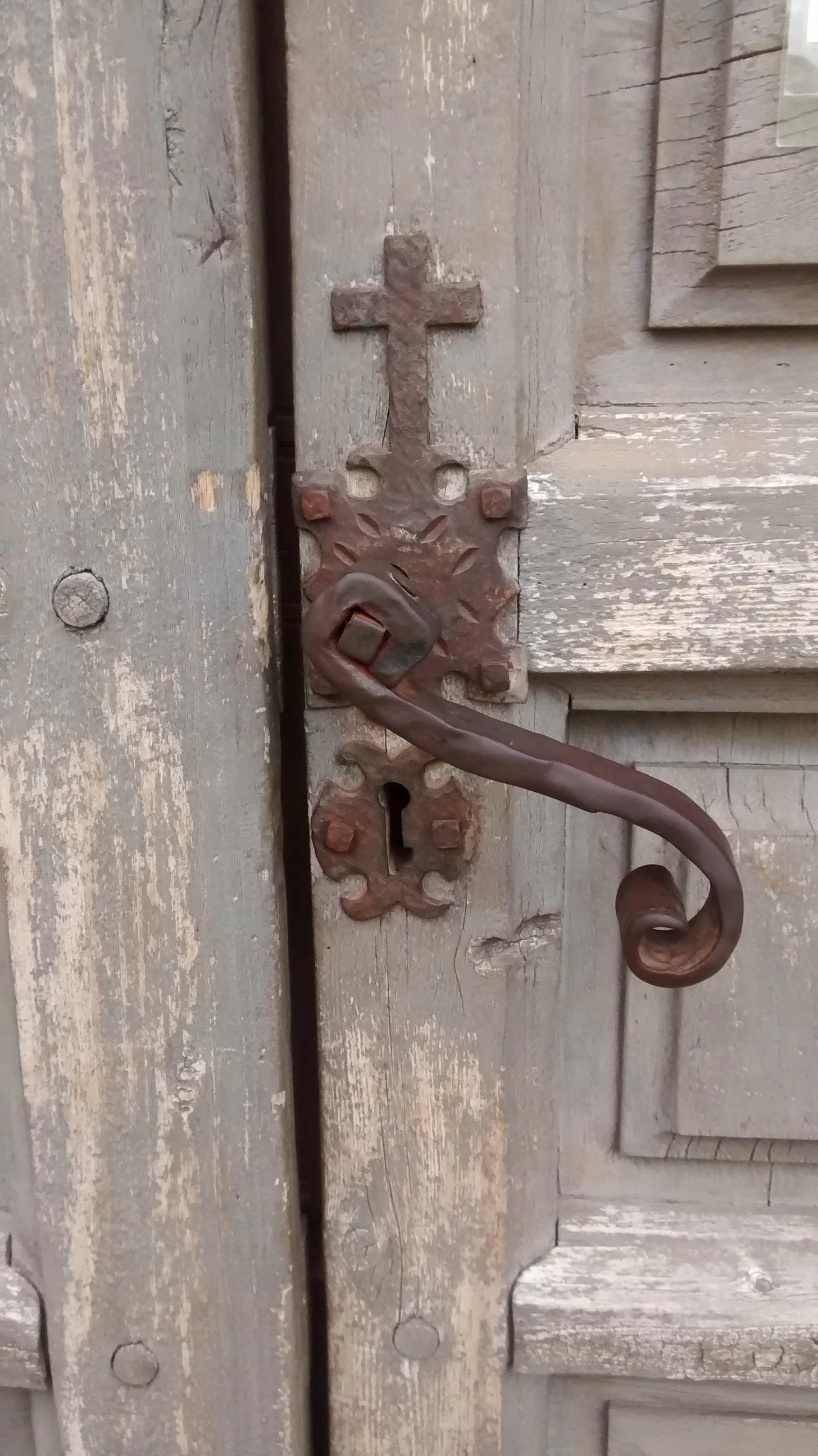Church door, Mission Trail, San Antonio, TX (photo: me and my cell phone)