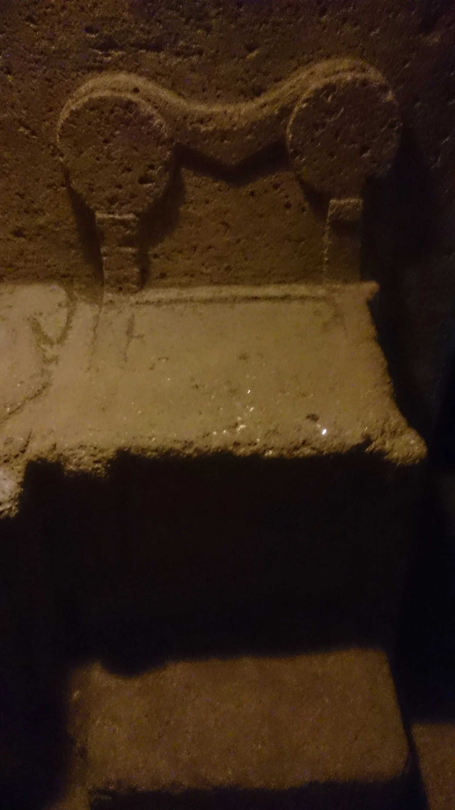 Chair within the tomb.