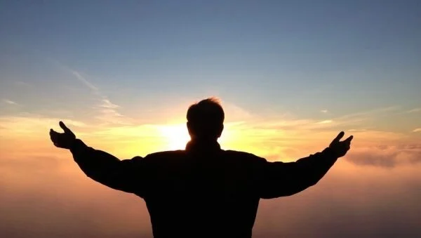 Man with arms extended.jpg