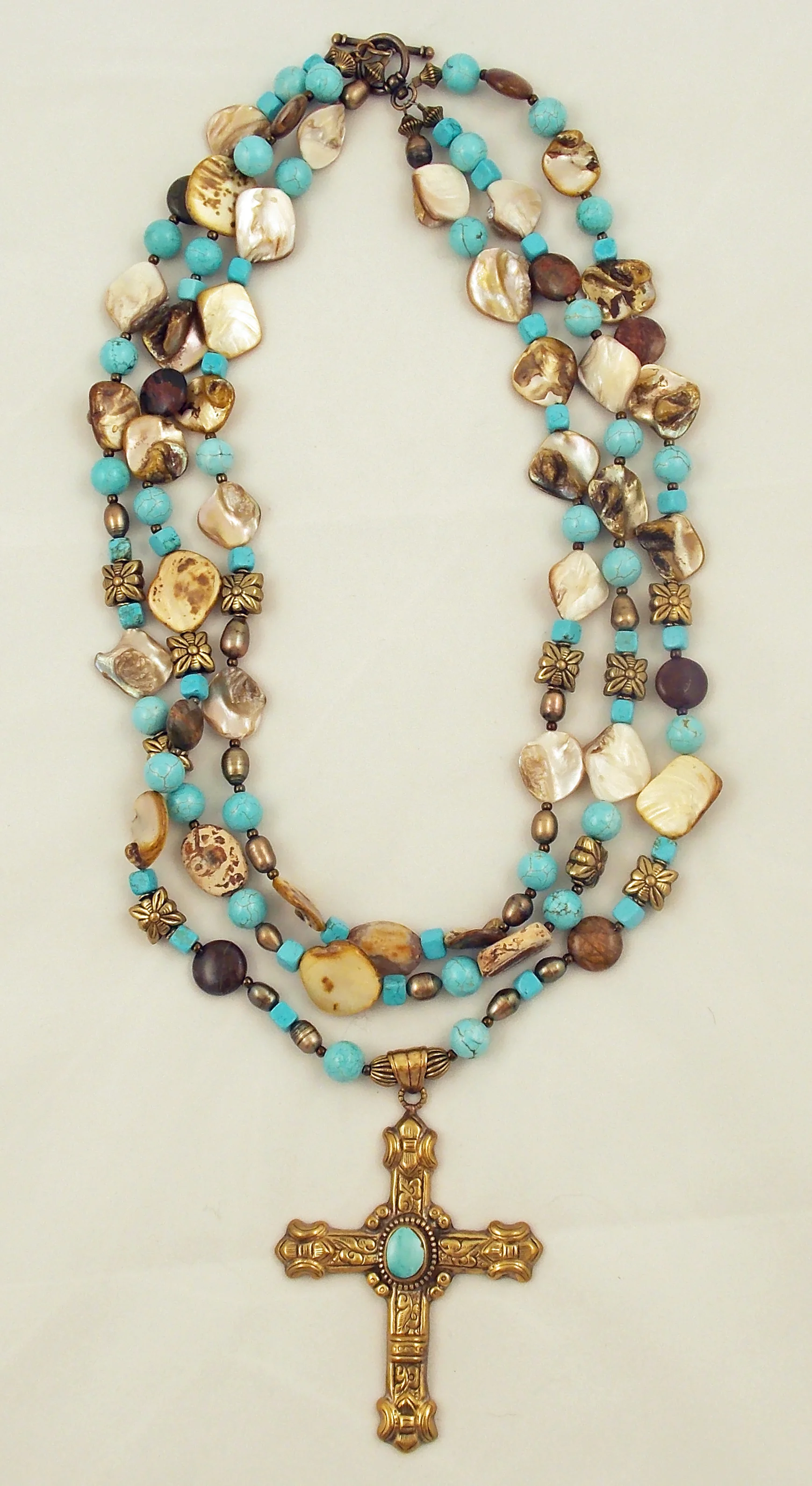 brass cross necklace