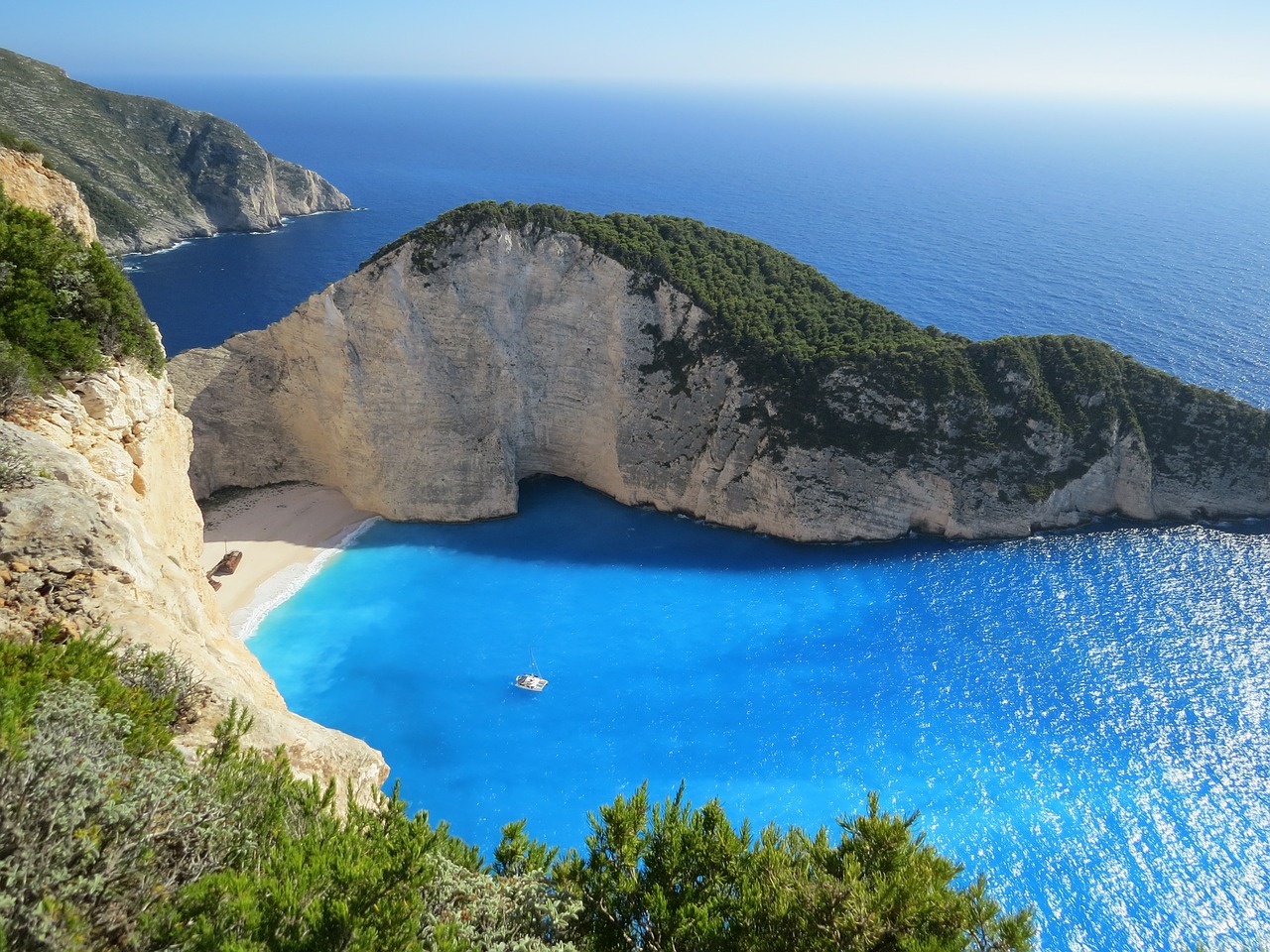 images of GREECE from: https://pixabay.com/en/sea-bay-waterfront-beach-nice-418742/