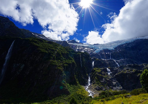WATERFALLS PUMP AFTER A FEW DAYS OF RAINFALL NEAR THE ROB ROY GLACIER HIKE | MT. ASPIRING NATIONAL PARK
