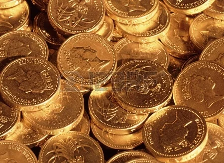 20330843-pound-sterling-coins-under-tungsten-lighting.jpg