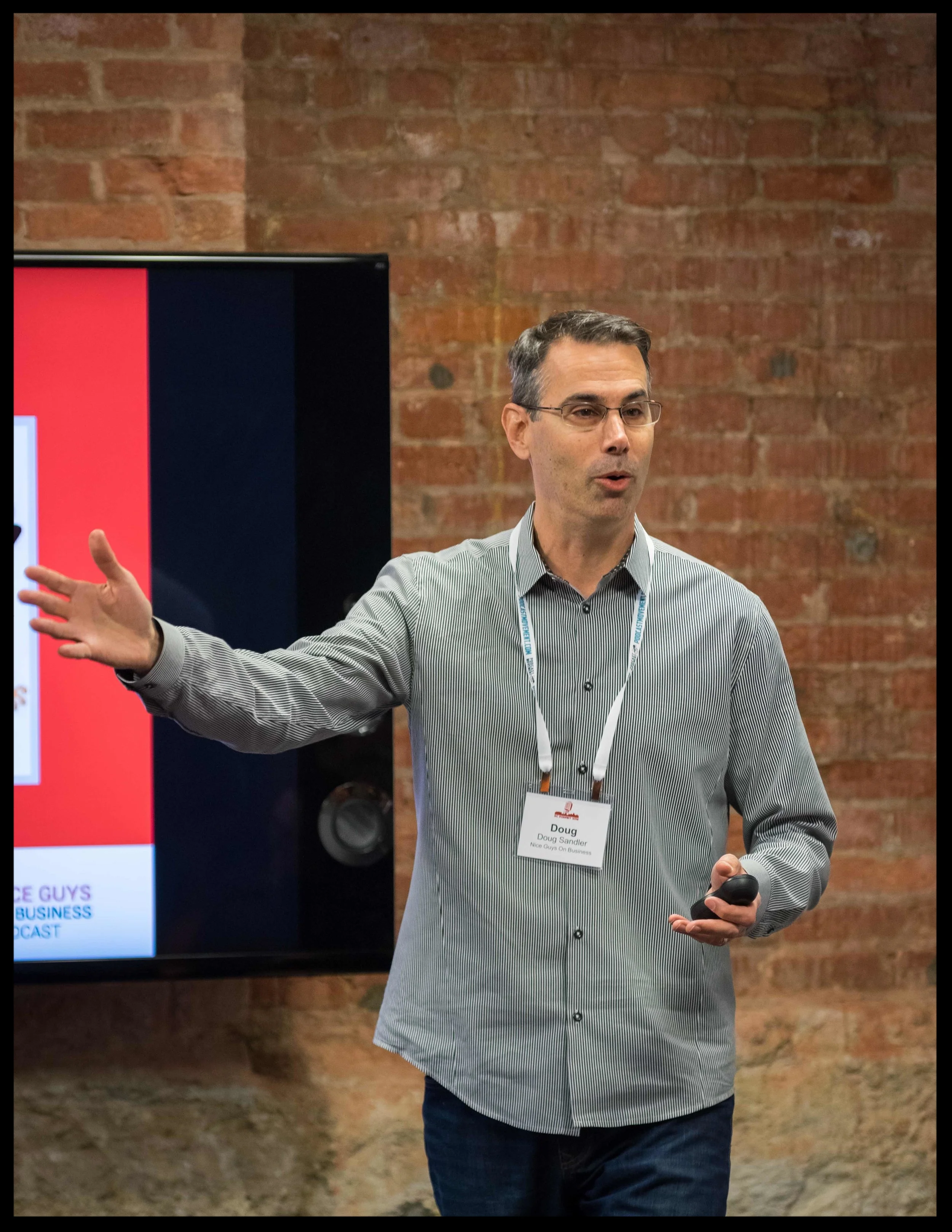 Doug speaking at DCPodfest 2016. Training session on soft skills. Adding humor to a business podcast.