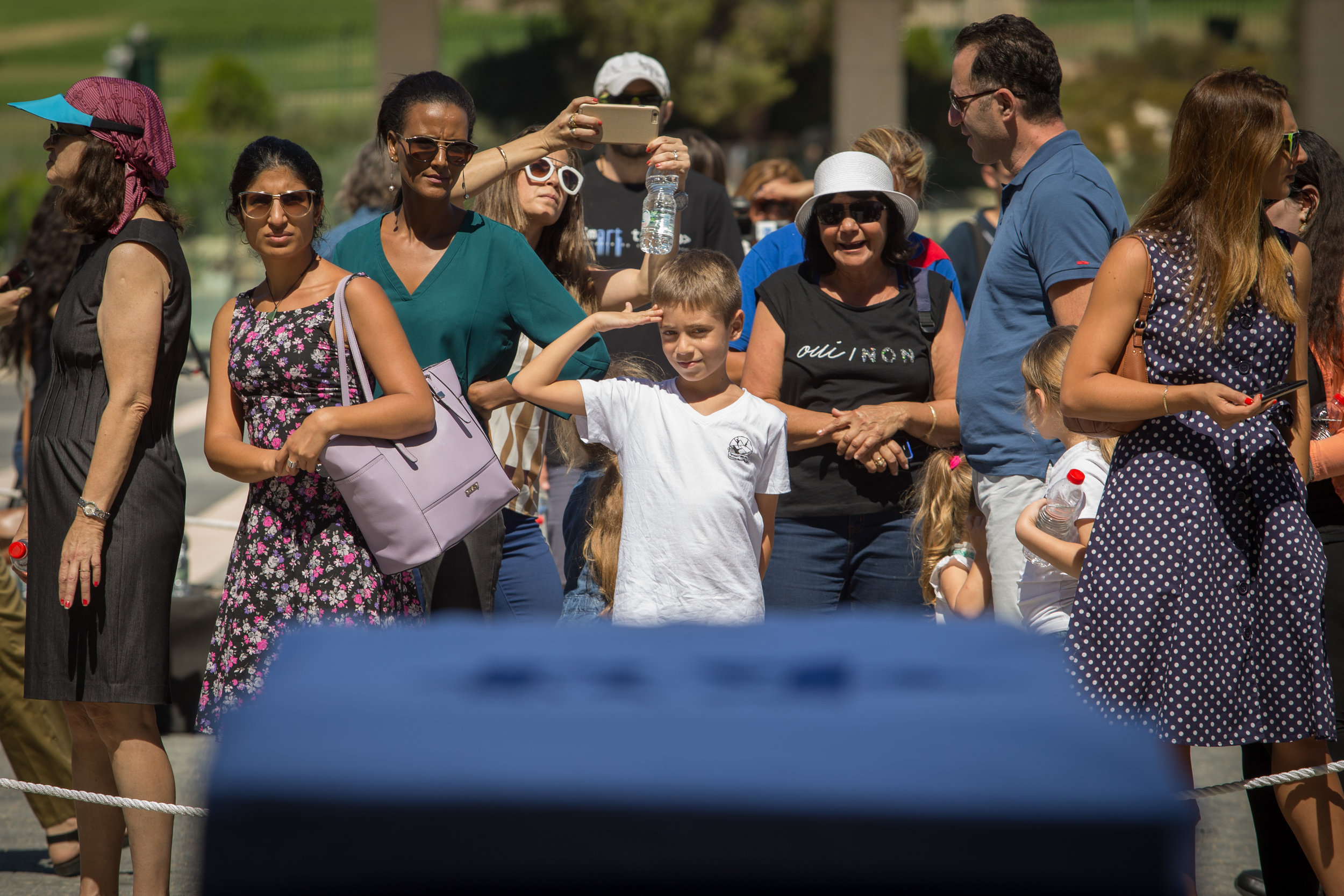  a child salutes while passing by the coffin of former israeli President Shimon Peres at the Israeli Parliament the knesset 