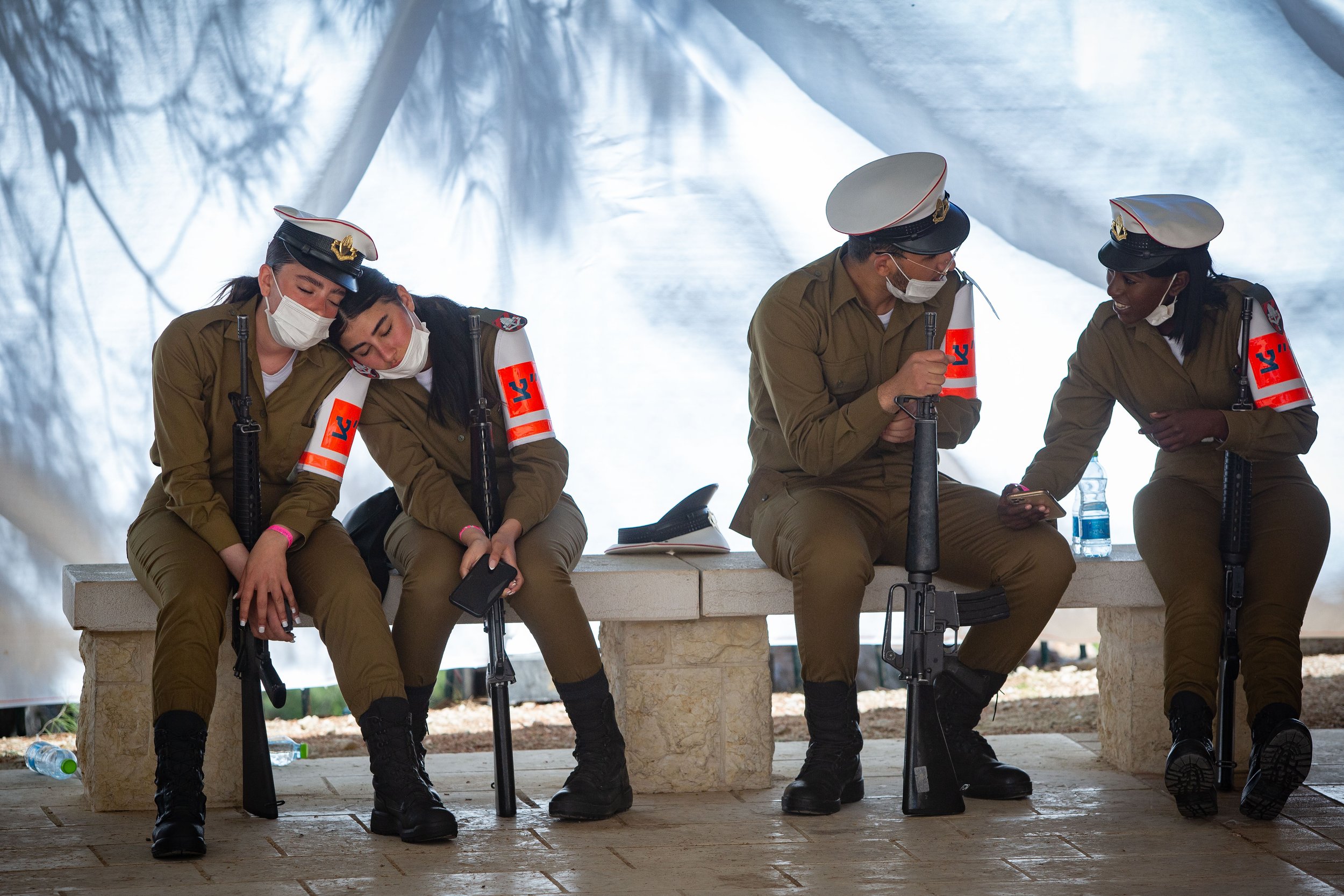  Israeli soldiers at Mount Herzl military cemetery in Jerusalem, April 14, 2021. 