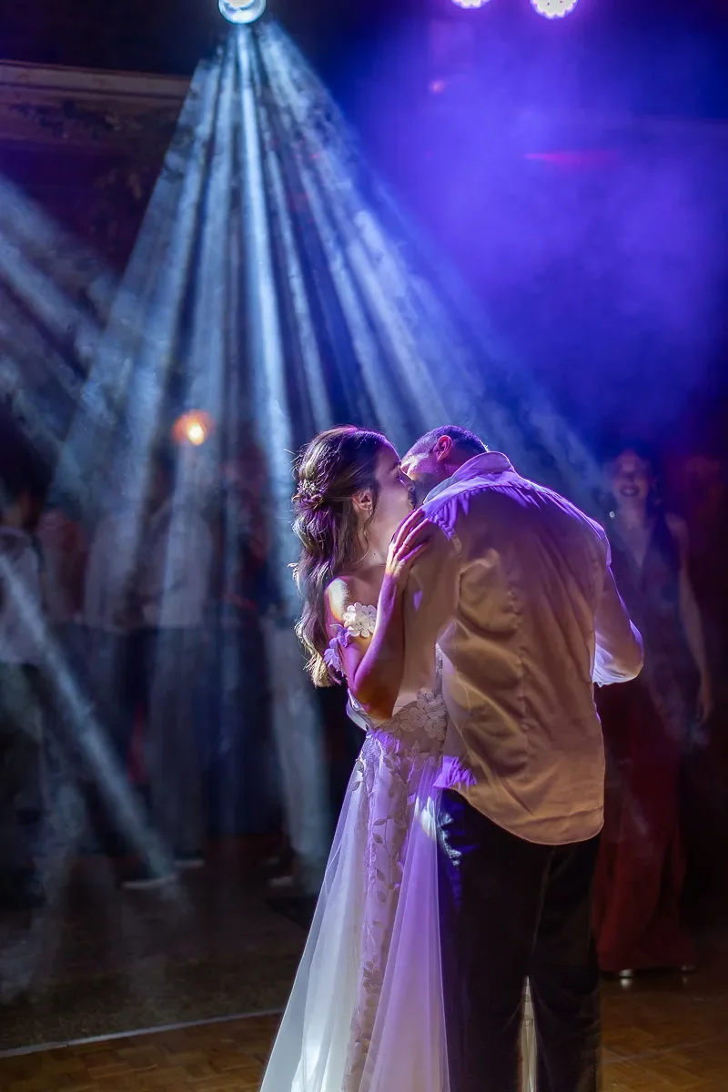 couple dance in sinterina wedding party